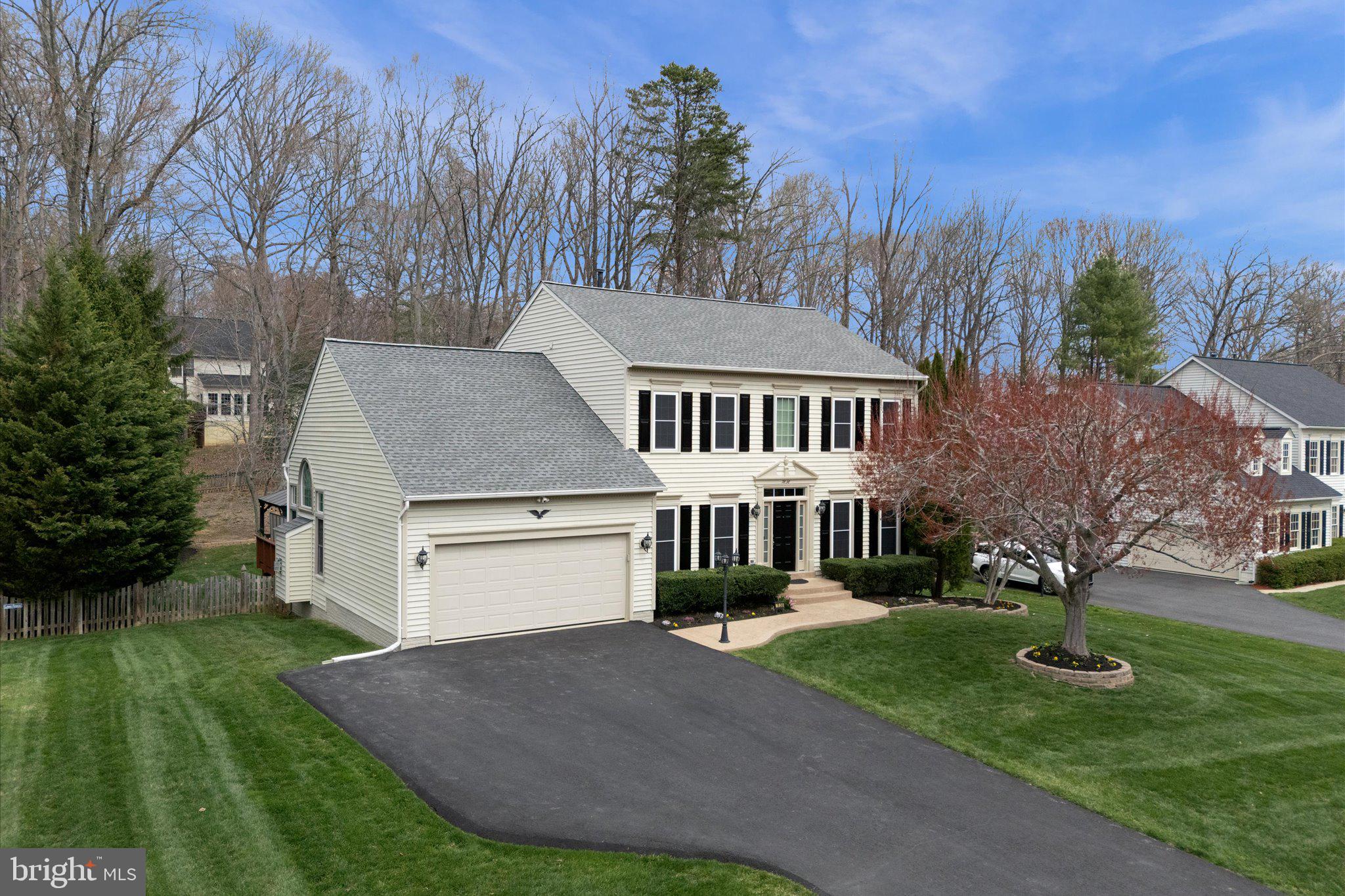 Charming 4-Bedroom Colonial on Nearly ½ Acre – Private Lot with Fantastic Upgrades! This home is nestled on a spacious, nearly half-acre lot in a highly sought-after community! With a private, treed backyard, a new patio and front walkway, and a large deck with an awning, this home is perfect for outdoor living and entertaining. Inside, you’ll find fresh paint and new carpet, along with beautiful ceramic tile flooring. The kitchen boasts newer appliances, making meal prep a breeze, while the cozy family room offers plenty of space for gatherings. Four spacious bedrooms upstairs, newer vanity and fixtures in primary bath. The unfinished basement provides endless possibilities—create a recreation room, home gym, or additional storage space! Major exterior updates include a new garage door, driveway, and a roof that’s only 7 years old.  Exterior paint and power washing were just completed. The fully fenced backyard is ideal for pets or play, offering privacy and plenty of room to enjoy.  Located in an amazing community, and part of the highly-rated Colgan High School pyramid, this home offers both comfort and convenience. Meadowbrook Woods HOA amenities include a clubhouse- that can be reserved for parties and is equipped with a full kitchen, a large outdoor pool, swim team, playground, sports courts, pond, walking trails, open common areas, trash and recycling pick up - all for just $88 per month!
