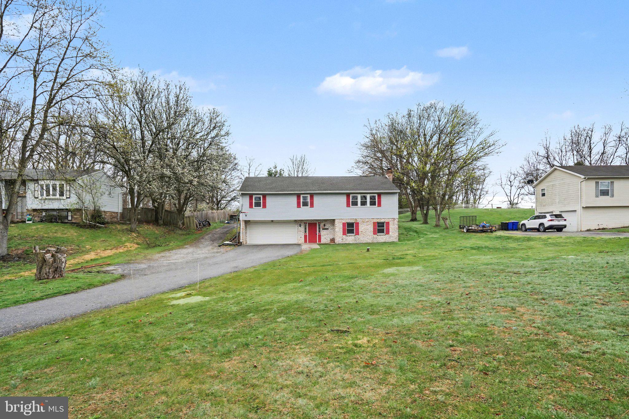 Well-situated bi-level offering space, comfort, and the potential to make it your own in the Dillsburg area. Set on a generous half-acre lot, this home features a functional layout with a natural separation of living spaces between the upper and lower levels. Offering 3 bedrooms and 1.5 baths, including a convenient primary suite, the home provides a solid foundation for a variety of living needs. The setting offers a rural feel while still providing quick access to nearby commuter routes and surrounding areas including Gettysburg, York, Camp Hill, and Harrisburg. If you're searching for a property full of opportunity, look no further!