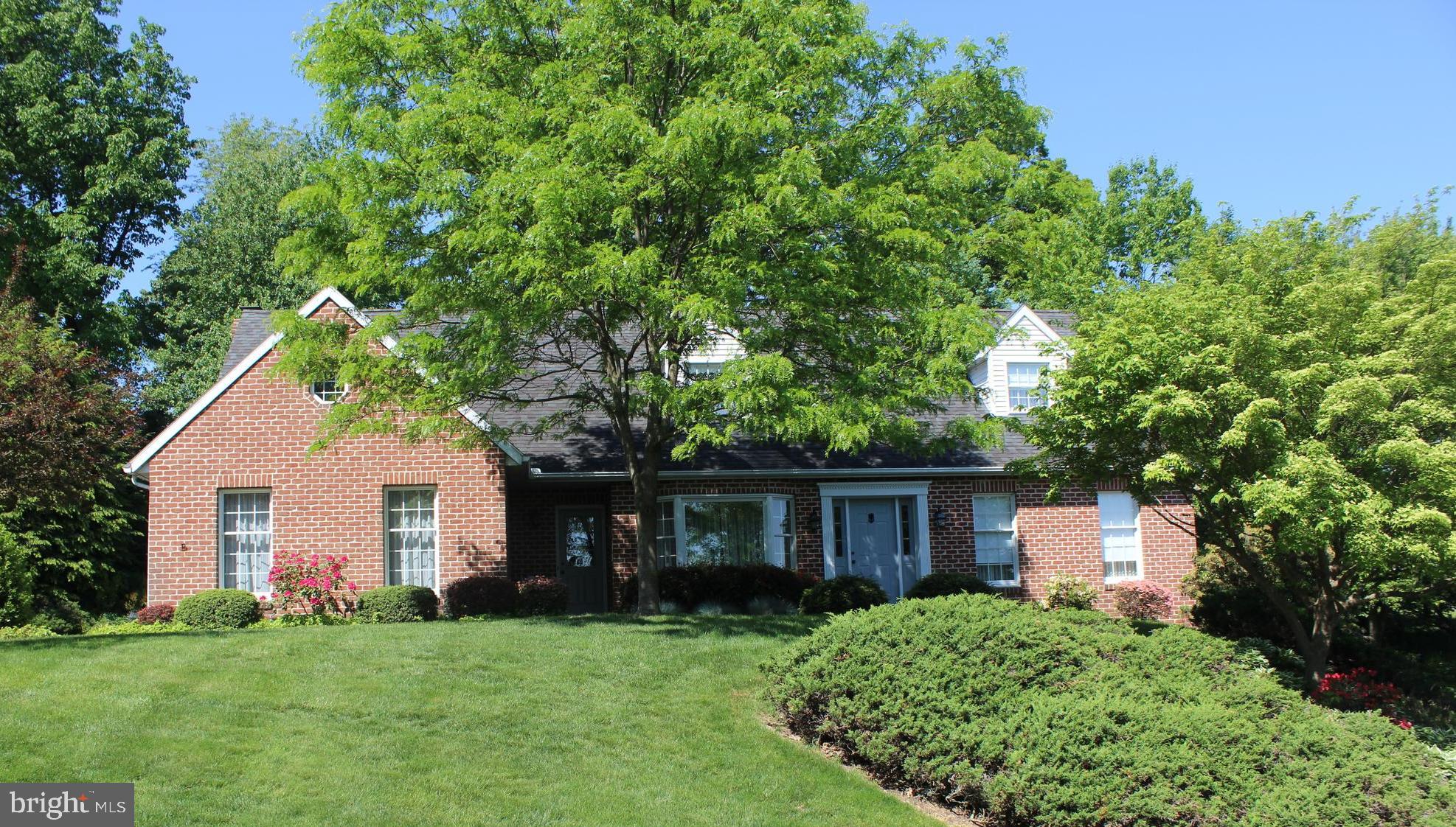 Nestled in mature Regents Hill neighborhood you will find this cape still close to all conveniences and Kissel Hill Elementary. Easy first floor living! This just over 2000 sq ft home offers a spacious first floor including a formal living room, dining room and an open floor plan in the kitchen, dining area and family room. Enjoy the family room fireplace while cooking, eating and relaxing. Kitchen is accented with soft recessed illumination, raised panel cherry cabinets and quartz counters. The bedroom has a pocket door to access the main floor full bath. Convenient first floor laundry (with brand new washer and dryer 2020) also serves as a mudroom with 2 separate entries from the garage and the outdoors. Upstairs hosts 2 bedrooms and a second full bath. Easy attic access from one bedroom for storage. Enjoy the seasons on the screened in porch overlooking the private landscaped yard with visiting deer and their fawns!