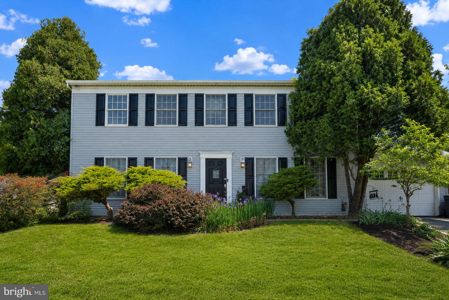Welcome to 509 Central Ave Court in sought-after Brendon Village! This beautifully maintained 4 bedroom, 2 full and 2 half bath Colonial offers the perfect blend of space, comfort, and functionality. Featuring over 3,400 square feet of living space including a fully finished walkout lower level, this home has been thoughtfully updated throughout the years. The main level offers a traditional floor plan with a formal dining room, spacious living room/home office, convenient first-floor laundry, and an expansive family room with a cozy brick fireplace that flows seamlessly into the updated kitchen. The kitchen is sure to impress with stainless steel appliances, a farmhouse sink, tile backsplash, center island, breakfast area, and abundant cabinetry.

Upstairs, you'll find four generously sized bedrooms, including a spacious owner's suite enhanced with custom California Closets and ample storage. The bathrooms feature beautiful travertine tile and tasteful updates throughout. Engineered hardwood flooring and luxury vinyl plank flooring add warmth and durability across the home. 

The fully finished lower level expands your living options with a large family/recreation room, dedicated office or flex space, half bath, second kitchen, and walkout stairs perfect for entertaining, multi-generational living, hobbies, or working from home.

Step outside to your private backyard retreat featuring a spacious deck, pergola, stone patio, raised garden beds, storage shed, and fully fenced yard with 5 foot aluminum fencing. Mature landscaping and extensive hardscaping create an inviting outdoor space for relaxing, gardening, and entertaining. Conveniently located near shopping, dining, parks, and commuter routes, this home offers the lifestyle you've been searching for.