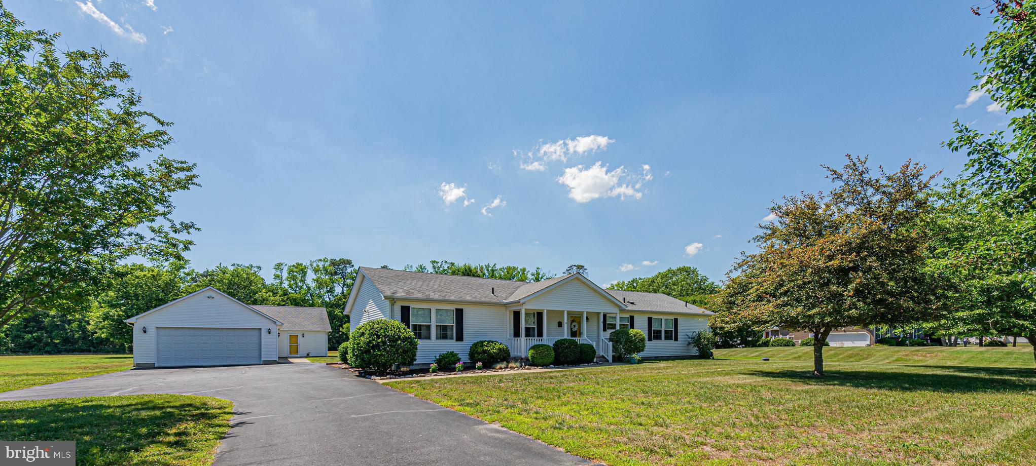 Nestled on a beautifully maintained 2.63-acre homesite, this immaculate and spacious property offers the perfect blend of timeless traditional charm, modern comfort, and exceptional versatility. From the moment you arrive, you’ll appreciate the pride of ownership evident throughout this meticulously cared-for estate.

The main residence, built in 2003, features over 2,000 square feet of thoughtfully designed living space with 3 generous bedrooms, 2 full baths, and a convenient half bath. Warm and inviting, the home offers a classic floor plan that balances comfortable everyday living with elegant spaces for entertaining Loved ones and friends.

Adding incredible value and flexibility is the detached garage with a private apartment-style in-law suite built in 2010.   Offering  another approximately 900 square feet, this well-appointed guest residence includes 2 bedrooms and 1½ baths, making it ideal for loved ones, visiting guests, a home office, or potential rental opportunities.

Outdoor enthusiasts will love the community boat ramp access just down the street, allowing convenient access for boating and water recreation. Despite this desirable amenity, the HOA is just $500 annually.

Rarely does a property combine acreage, privacy, immaculate condition, and multi-generational living opportunities so seamlessly. Whether you’re searching for a peaceful country retreat, a place to accommodate loved ones and guests, or simply room to spread out and enjoy life, this exceptional property delivers it all. A truly remarkable offering that must be experienced to be fully appreciated.