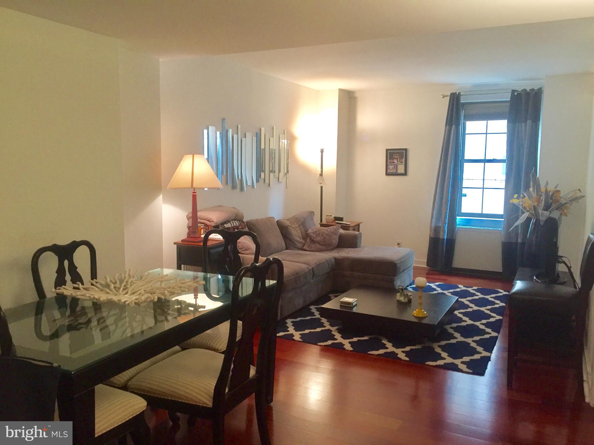 Beautifully appointed one bedroom, one bathroom at Parc Rittenhouse! The spacious great room enjoys ample space for both living and entertaining as well as an open dining area. The galley-style kitchen features stainless steel appliances and granite countertops. Sleek Brazilian cherry hardwood floors flow throughout. The bedroom is generously sized and has a large wall closet. There is a marble-appointed bathroom with tub shower. Additional highlights include excellent closet space and in-unit washer/dryer. Residents of Parc Rittenhouse enjoy world class amenities and services including a 24 hour doorman; an amenities suite including a state-of-the-art fitness center and resident lounge with pantry; media room; outdoor rooftop pool club with a large pool deck, full size pool, kids pool and hot tub; garage parking below the building for an additional fee, subject to availability; and two amazing restaurants on the ground floor, Stephen Starr’s Parc and Via Locusta.