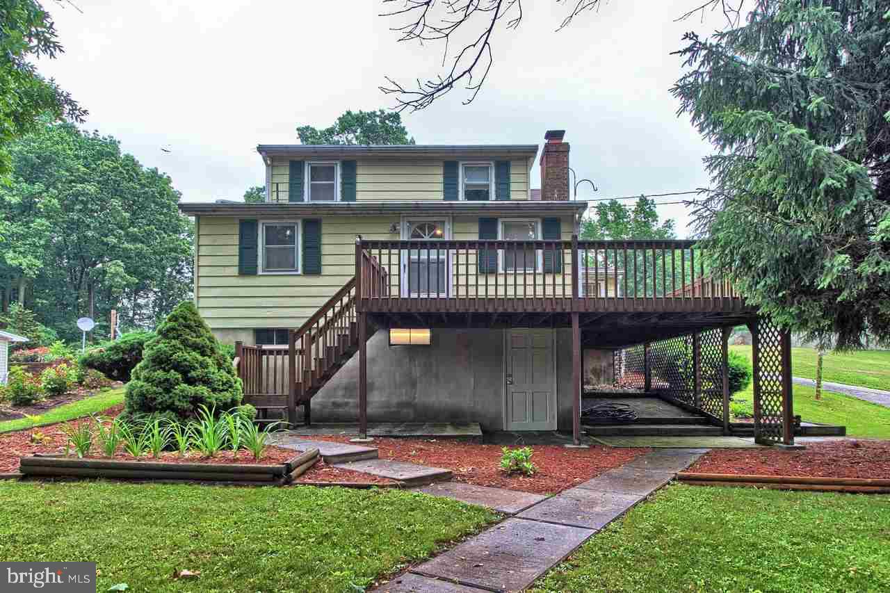 Serenity! Enjoy 6 acres of your very own open country space. Football field in the backyard and for the naturalist, a couple of wooden acres. Great location - just minutes from I83.