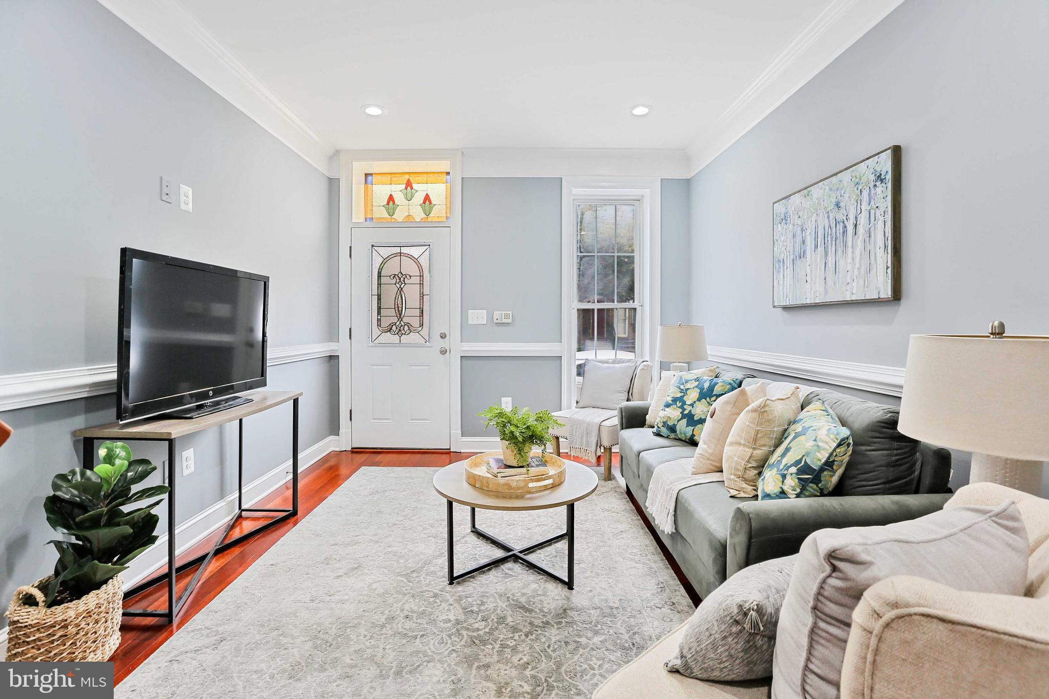 IMMACULATE FOUR-STORY NEWLY RENOVATED HOME IN THE HEART OF FEDERAL HILL NOW AVAILABLE. OVERSIZED RESIDENCE WITH 4 ABOVE GRADE BEDROOMS. FINISHED LOWER LEVEL WHICH INCLUDES THE 5TH BEDROOM. EASY TO ACCESS OFF-STREET DEEDED PARKING PAD. GLISTENING BRAZILIAN CHERRY HARDWOODS CASCADE THROUGHOUT THE ENTIRE HOME. ENJOY CUSTOM CREAM CABINETRY, UPGRADED TRIM AND PAINT PACKAGE, IMPORTED TILE, GRANITE COUNTERTOPS, SS APPLIANCE PACKAGE IN CHEF'S KITCHEN WITH LARGE PANTRY AND DINING SPACE. LOADS OF NATURAL LIGHT. HIGH CEILINGS. TONS OF STORAGE. WALK-IN SHOWERS. WALK-IN CLOSETS. VIDEO SURVEILLANCE. SPACIOUS 5 BEDROOMS WITH 3 FULL BATHROOMS AND 3 HALF BATHROOMS. 4TH LEVEL INCLUDES EXPANSIVE ROOF DECK WITH STUNNING CITY VIEWS AND WET BAR - GREAT FOR ENTERTAINING. CLOSE PROXIMITY TO RETAIL SHOPPING, LOCAL DINING, AND ALL MAJOR HIGHWAYS. SCHEDULE A PRIVATE TOUR TODAY.