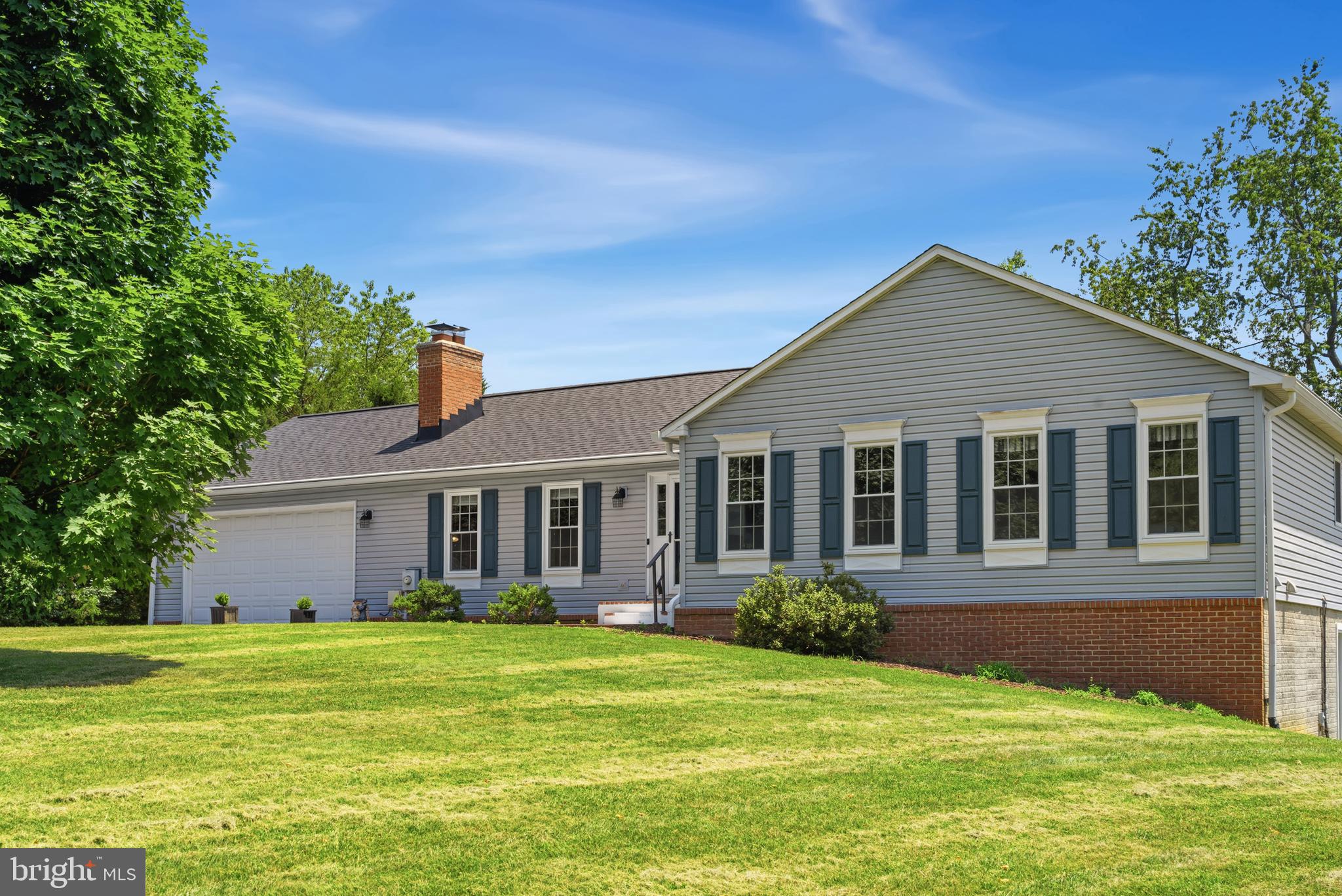 OPEN HOUSE 7/25 11am-1pm. You won't want to miss this move-in ready 4br, 3 full bath home. It's updated throughout! NO HOA!! HOME WARRANTY included for 1 year for you peace of mind.  Situationed on 2.4 ac, the lot gives privacy with easy access to beautiful trails! Imagine being able to bike, hike and walk to the lake right from your own yard! Situated on Black Hill Regional Park, this unique part of Boyds is truly a treasure, the view only changes with the seasons.  You're minutes from everything, but feel like you're living in the country. This home features single level living, a fully finished basement that nearly doubles the finished square footage (completed in 2021) including full bath and bedroom/den, open concept rec room that is large enough for multi-generational living or great hang out space. The kitchen has been upgraded with two-tone painted cabinets, solid surface counters, updated appliances and spectacular views. The attached family room has a gas-burning fireplace and there's a roomy dining area that overlooks the backyard with access to the huge deck. Major system upgrades include roof, front windows, siding, gutters with gutter guards, radon system, water softener and filter, I could go on, but there's a whole list available, just ask. Verizon FIOS is available for high speed connectivity. Commuting to work? You're only a mile from I270 with a MARC train station just down the road as well. Relax and watch the wildlife, while being just minutes away from all the modern conveniences. Other features include an invisible fence for your dogs, no covenents or restrictions, plenty of room to enjoy your private property, space in the finished basement to add a kitchenette for a fully separate living space. This property is ZONED FOR LIVESTOCK and farming activities if you choose to enjoy those hobbies as well.