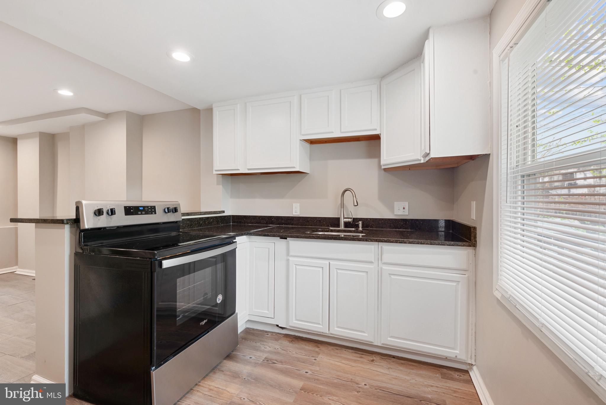 PRICE DROP! Welcome to your charming new home in the heart of Washington Village/Pigtown! This beautifully renovated 2-bedroom, 1-bathroom row home seamlessly blends original character with modern convenience. Boasting 672 sq ft of living space, the home features an open floor plan and an abundance of natural light. The kitchen features granite countertops and stainless steel appliances, perfect for entertaining. 
Step outside to discover a private, fenced-in yard offering a rare urban oasis. The property is ideally located within walking distance to local shops, vibrant dining options, parks, and public transportation, ensuring an effortless urban lifestyle. Major systems are updated for peace of mind, making this gem truly move-in ready. 
This home won't last long—schedule a private tour today!