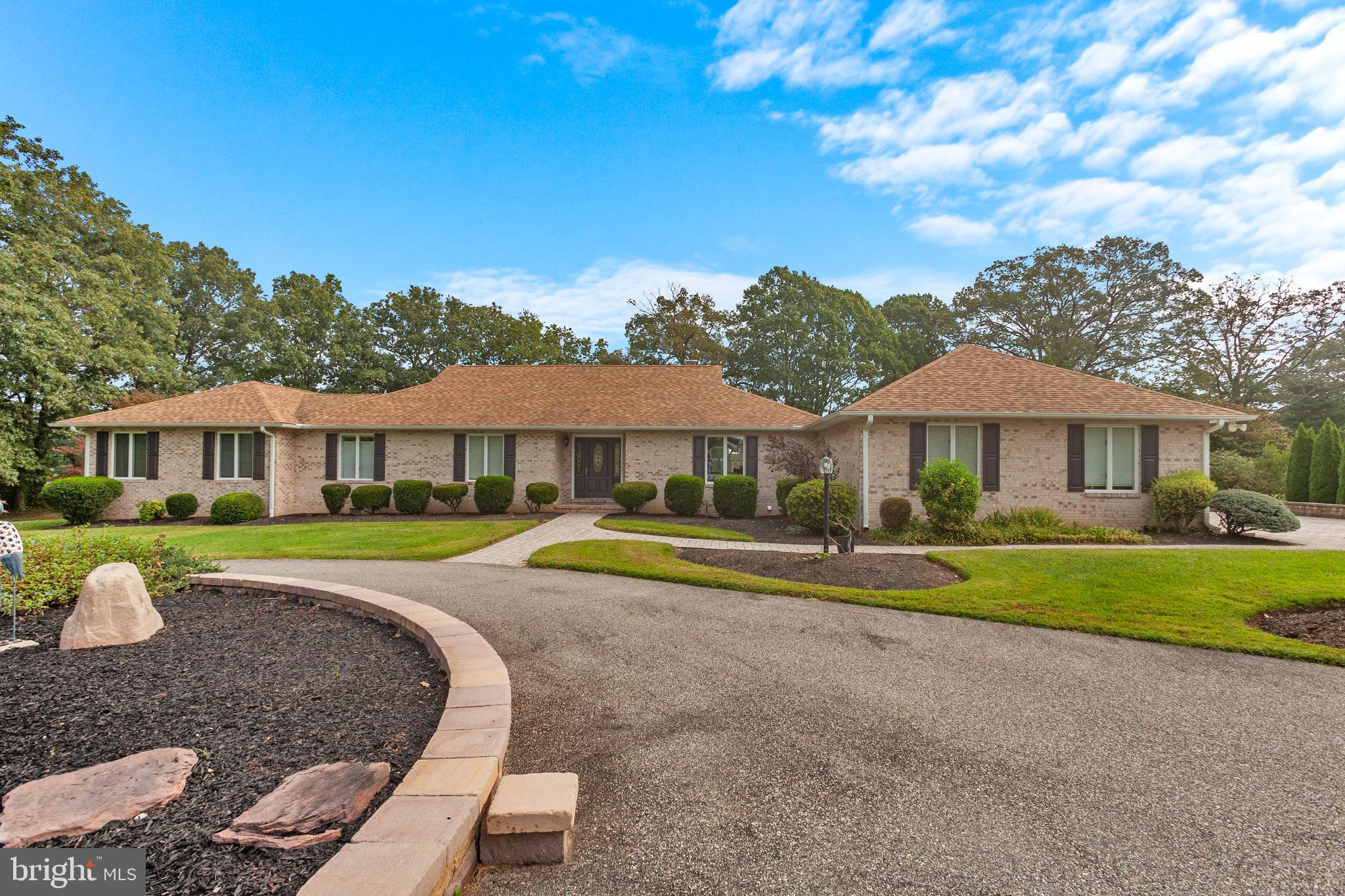 Welcome to 108 Bryans Channel Way. From the moment you enter the through the stone entrance and begin to see the Wye River on your approach to the house you can see this property is special. The asphalt and stove driveway lead you to the house and are greeted with a stunning pond with a water feature and long views down the river. Upon entering the home you are welcomed into a classic foyer with a dramatic vaulted ceiling living room complete with hard woods floors and a stacked stone fire place and commanding views of the pool and water.  Tons of natural light flood the living room and dining area making the gourmet kitchen that much more impressive. The kitchen is a chefs kitchens with all the storage you can imagine professional style cook top and hood, double sinks and double ovens. Off the kitchen there is a second living room with full bath, and a laundry complete with dog washing station. The bedrooms are on the opposite side of the house giving nice separation away from the entertaining area and all are graciously sized. One of the on-suite guest rooms has access to the tiled and separately conditioned sunroom which provides huge views of the river and outdoor space. The primary bedrooms is private and luxurious with a walk-in closet that could be used as an office and offers private access to the wrap around deck. The outdoor space is the true show stopper here with a gunite pool and hot tub, stone fire pit and an extensive paver patio and has to be experienced to appreciate the option and flexibility of the space. The property is nicely elevated and has a paver walkway leading you to the dock complete with 2 lifts (one 16,000lbs) and 2 jet ski lifts as well…. This property is private, convenient and impressive. Additional photos available upon request.