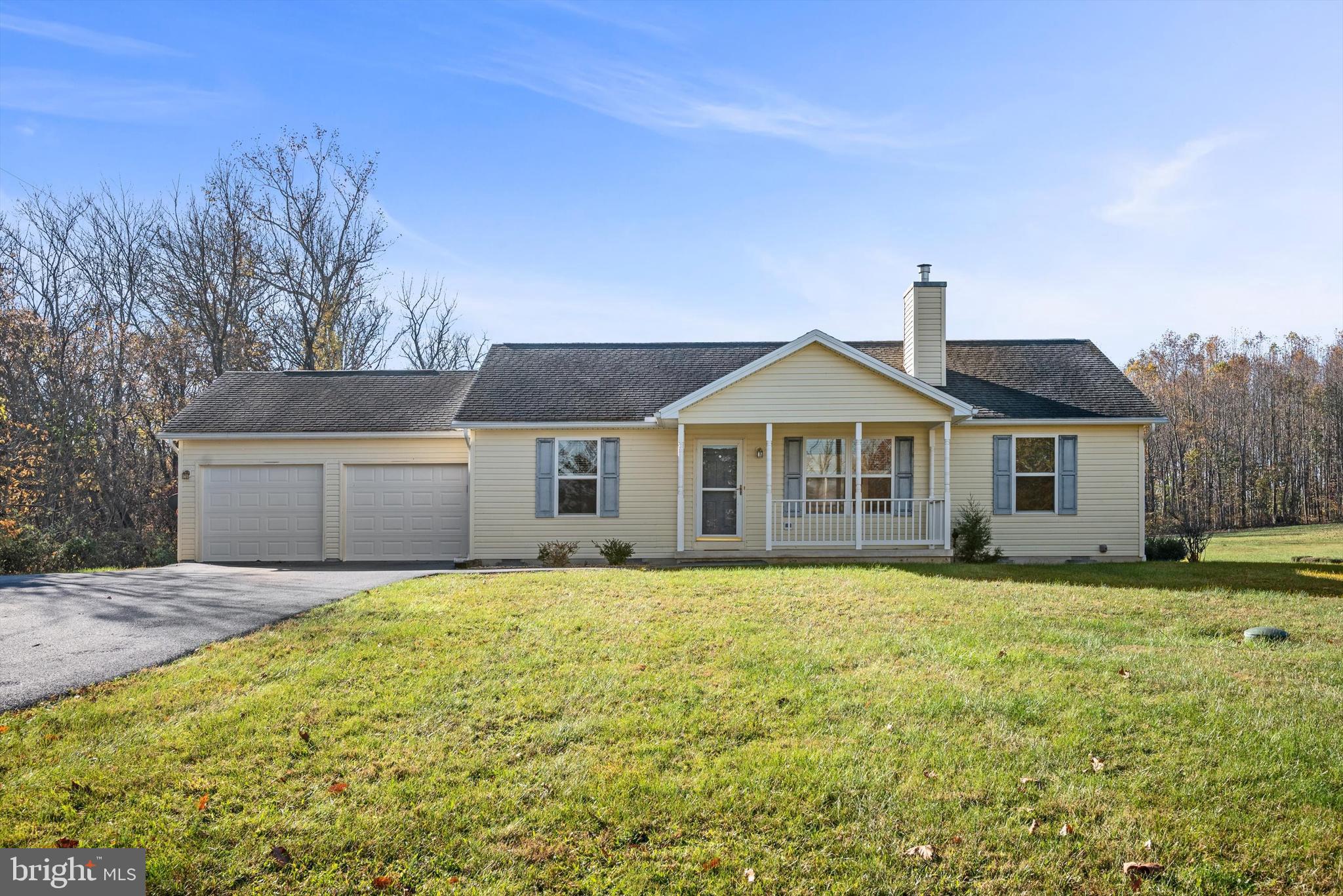 Inviting & modern rancher on a large lot with close proximity to the Potomac River! This 3 bedroom/2 bath home features a split bedroom floor plan, gas fireplace, newer HVAC system, and updated flooring in just under 1,300 easy-to-maintain square feet. It’s the perfect blank slate to move right in and make it your own! Enjoy the back deck and front porch that overlook the flat 1.87-acre lot with views of the beautiful mature trees. There’s also a shed and 2-car attached garage providing ample storage solutions. Located nearby is the Yankauer Nature Preserve, Whitings Neck Equestrian Center, and Izaac Walton League for convenient outdoor recreation. Take advantage of the opportunity to own this lovely river-adjoining property!