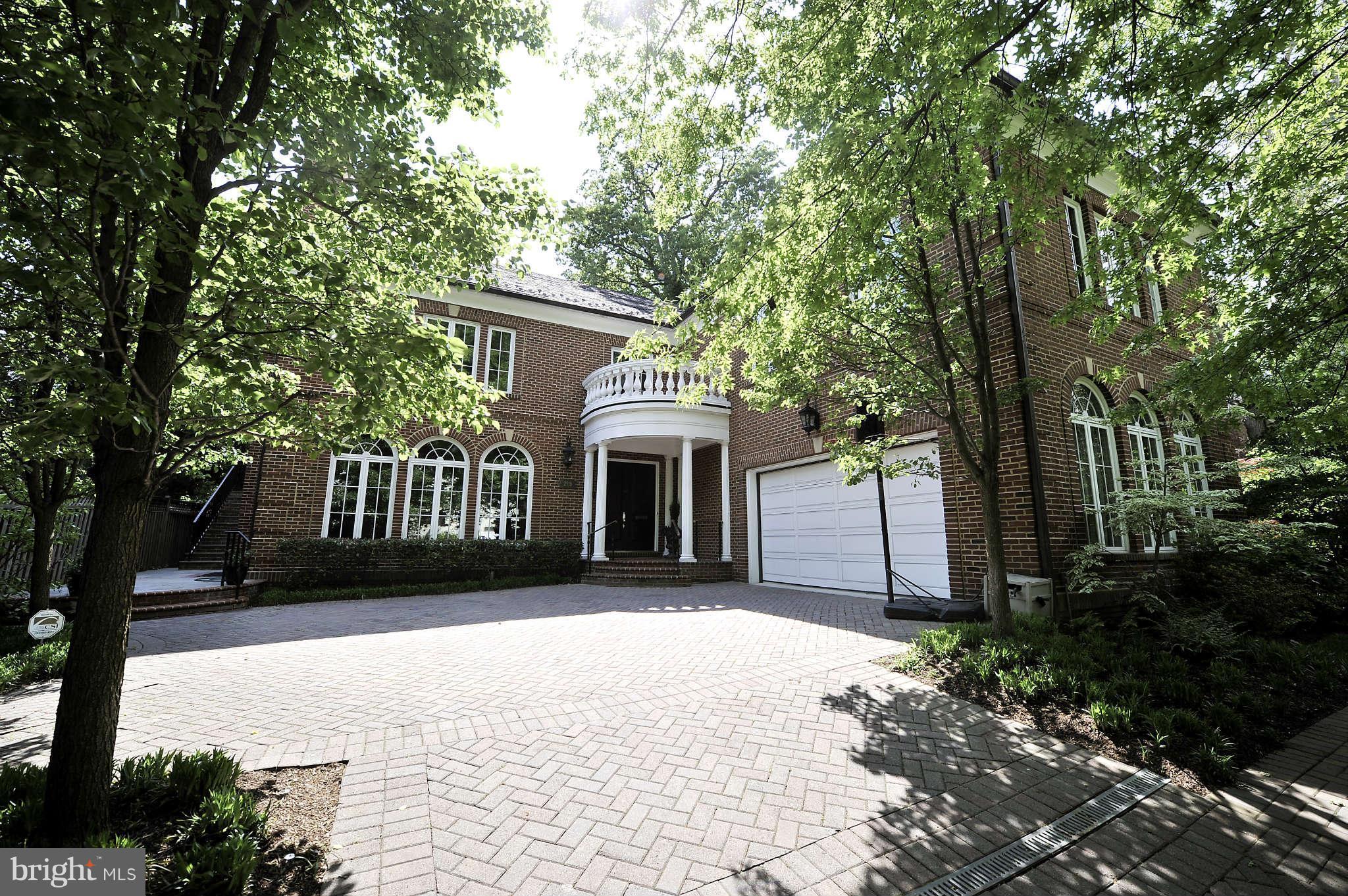 BROKER'S OPEN TUES (1/28) 12-1:30PM! Incredible space w/ formal, Diplomatic level w/ soaring 10 ft ceilings, w/ LR, DR, Entry Gallery, Great Rm, Chef's Kitch. Upper Family lvls w/ Kitch, Fam Rm, Break Rm, Mstr w/ huge dress hall & BA, addtl Mstr Ste & 2 guest rms & bonus rm. LL w/ 2 addtl BRs, large Rec Rm & ample storage space. All rooms of grand scale & design. Elevator to all 4 lvls. Must see!