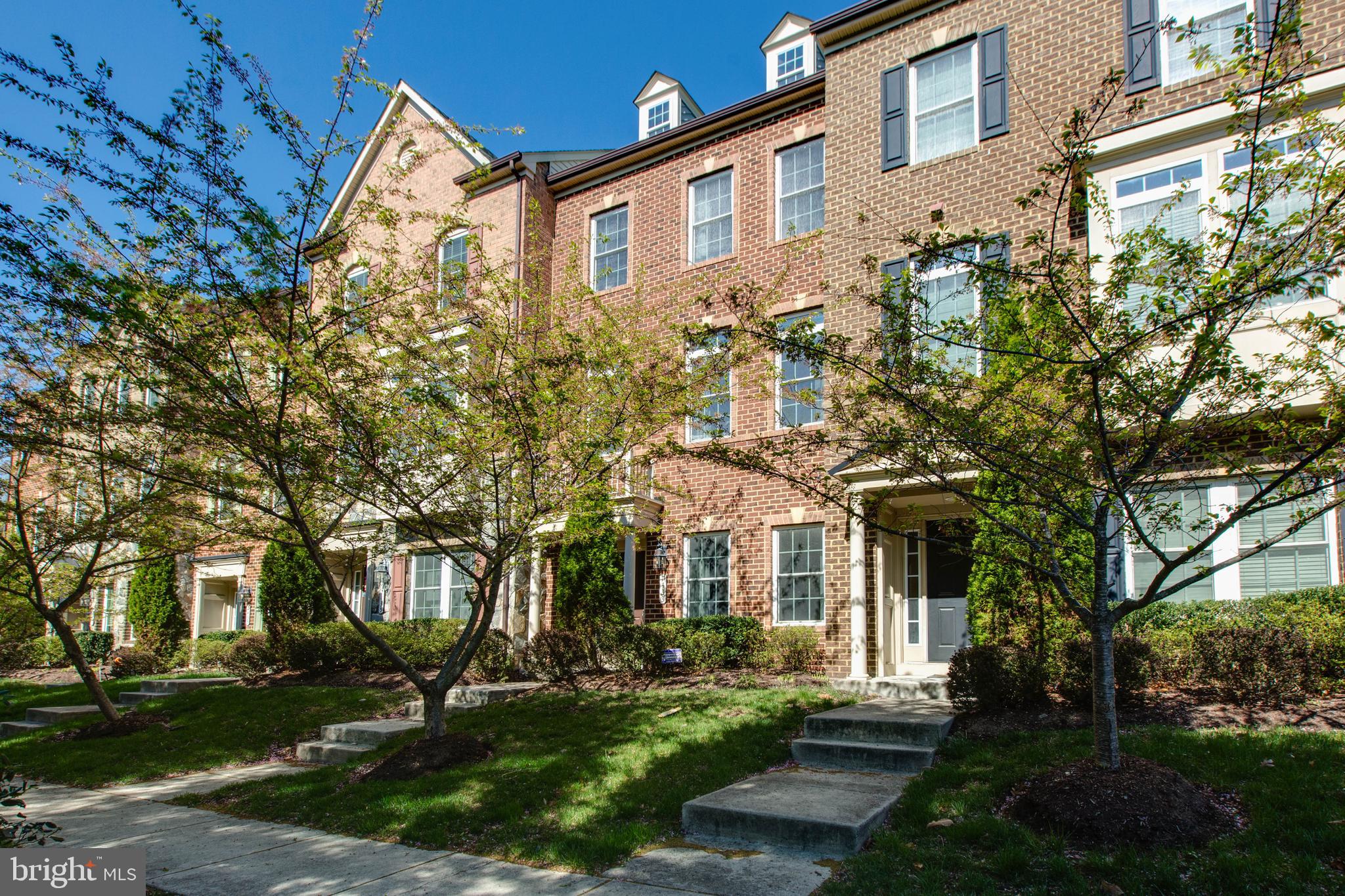 Welcome to 7433 Matapan Dr! This beautifully designed brick front end 2 car gararge townhome features an open floor plan that everyone desires, with a recently added first-floor 4th bedroom  for added convenience. The main floor is flooded with natural light and showcases numerous upgrades, including a 10' extension on all levels, a deck, a cozy fireplace, and hardwood staircases. The Parkside community offers fantastic amenities, including a clubhouse and swimming pool, perfect for leisure and relaxation. Additionally, the home provides easy access to all major highways and BWI Airport, making commuting and travel a breeze.