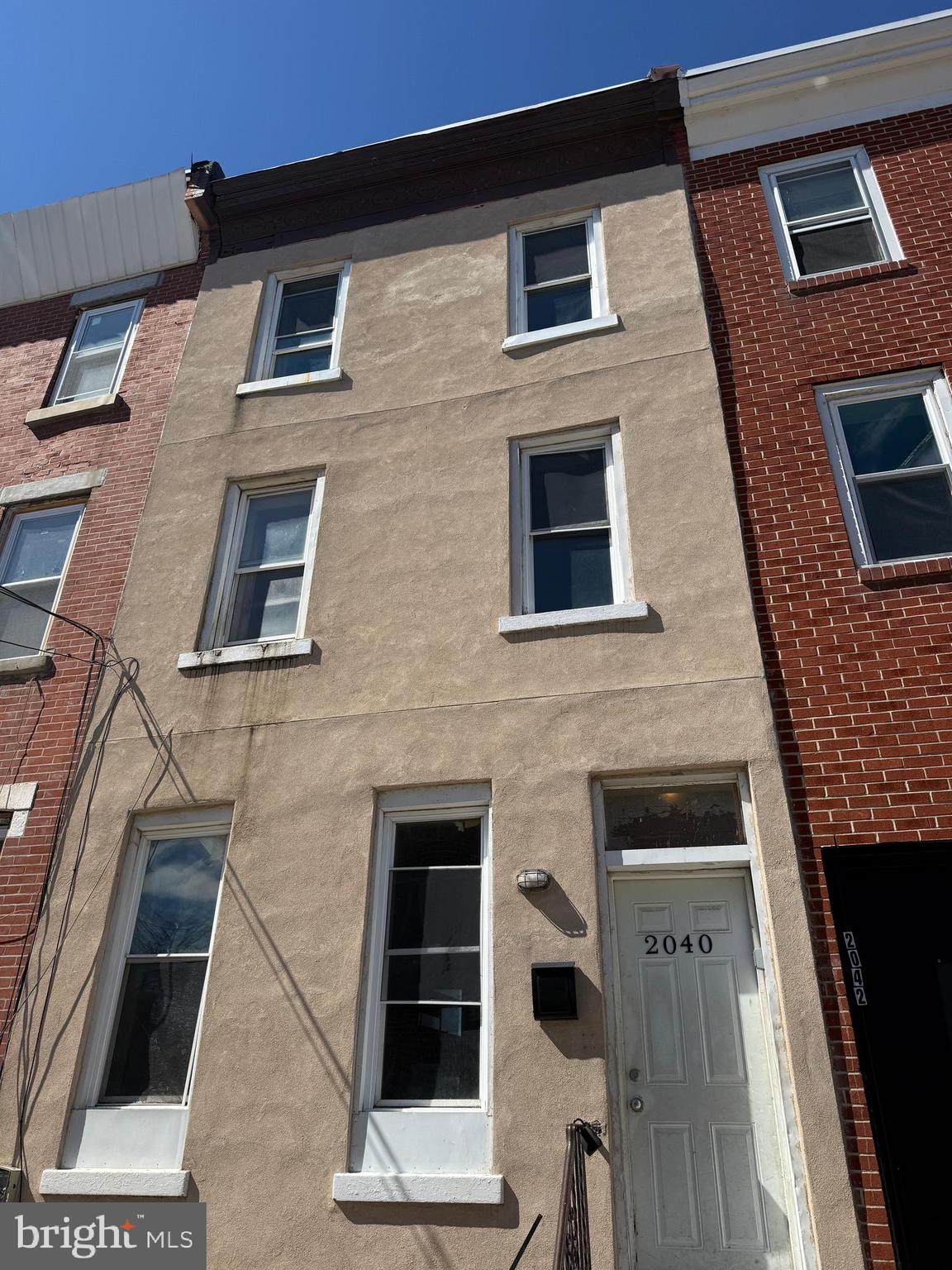 Opportunity awaits at 2040 N Lambert St, Philadelphia, a classic 5 bedroom 2 full bathroom Philadelphia rowhome located in the rapidly developing Temple University / North Philadelphia area, ideal for investors, flippers, or buyers seeking a value-add project. This property features a traditional rowhome layout with multiple levels of living space, several bedrooms, and a full basement for storage and mechanicals, with many rooms offering solid natural light and flexible layouts ready for renovation. The home requires repairs and updates and is being sold as-is, presenting strong potential for a full rehab, rental hold, or resale opportunity. Conveniently located near Temple University, public transportation, major roadways, and neighborhood amenities, the property sits in an area with strong rental demand and ongoing development, making it a compelling opportunity to renovate and capture upside value. Seller is a licensed agent in PA.