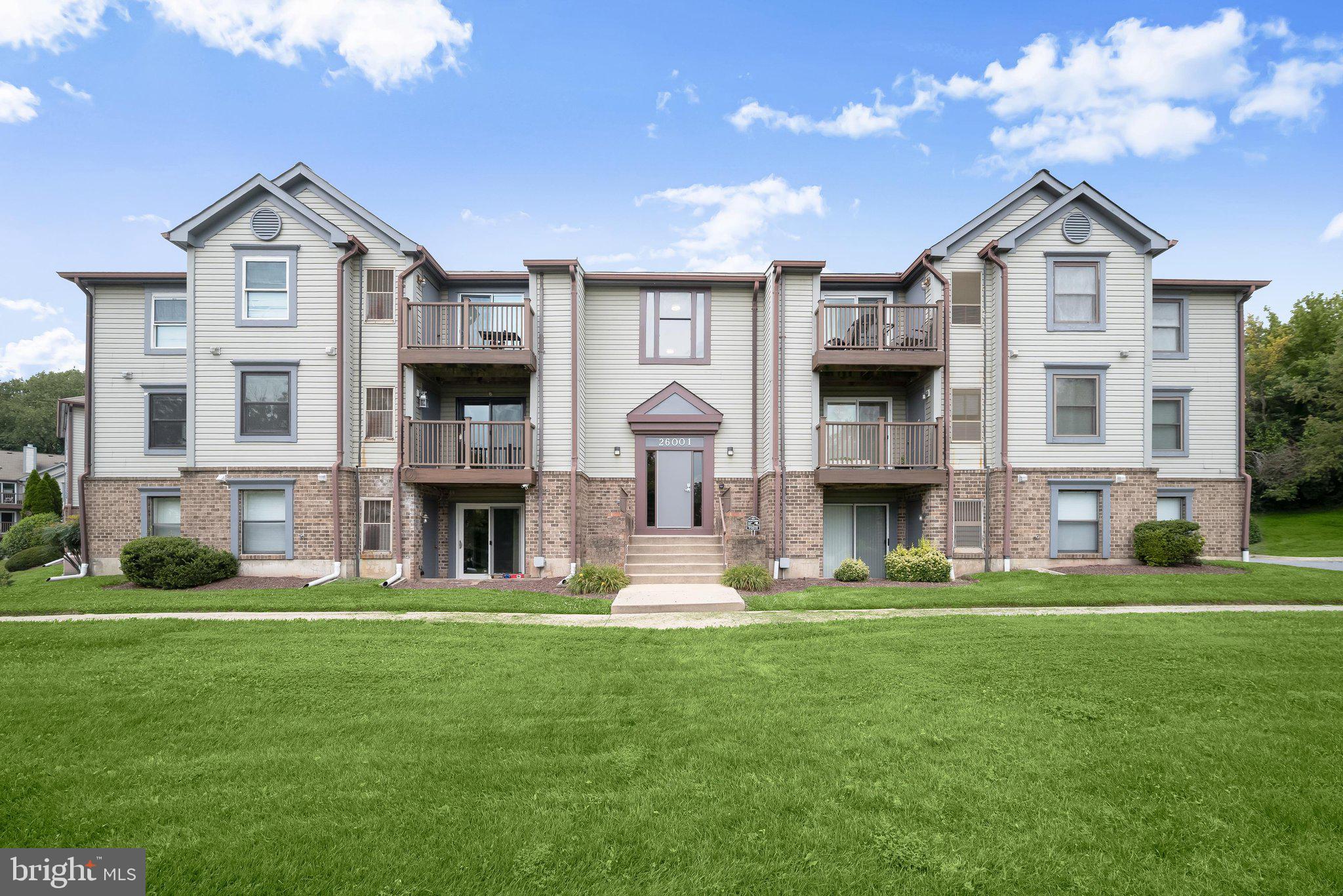 Welcome to 26001 Brigadier Place Unit E, a meticulously maintained condo that has been thoughtfully renovated and continuously updated over nearly two decades. Beginning with a comprehensive renovation around 2008, the home was remodeled down to the drywall, with select areas taken to the framing, resulting in beautifully modernized finishes and systems throughout. Recent improvements include new bedroom carpeting and a new washer and dryer in 2025. The fully renovated kitchen features granite countertops, updated cabinetry, an expanded peninsula, decorative tile backsplash, custom pantry shelving, recessed lighting, updated plumbing, and upgraded appliances. Both bathrooms have been completely remodeled with stylish fixtures, glass-enclosed showers, and modern finishes. Hardwood flooring enhances the main living areas, complemented by tile flooring in the foyer, crown molding, recessed lighting, updated fixtures, and custom closet organization systems. Anderson replacement windows, an Anderson sliding glass door, updated electrical and plumbing systems, replaced interior doors and trim, and numerous additional upgrades reflect the exceptional care and pride of ownership found throughout this move-in ready home.