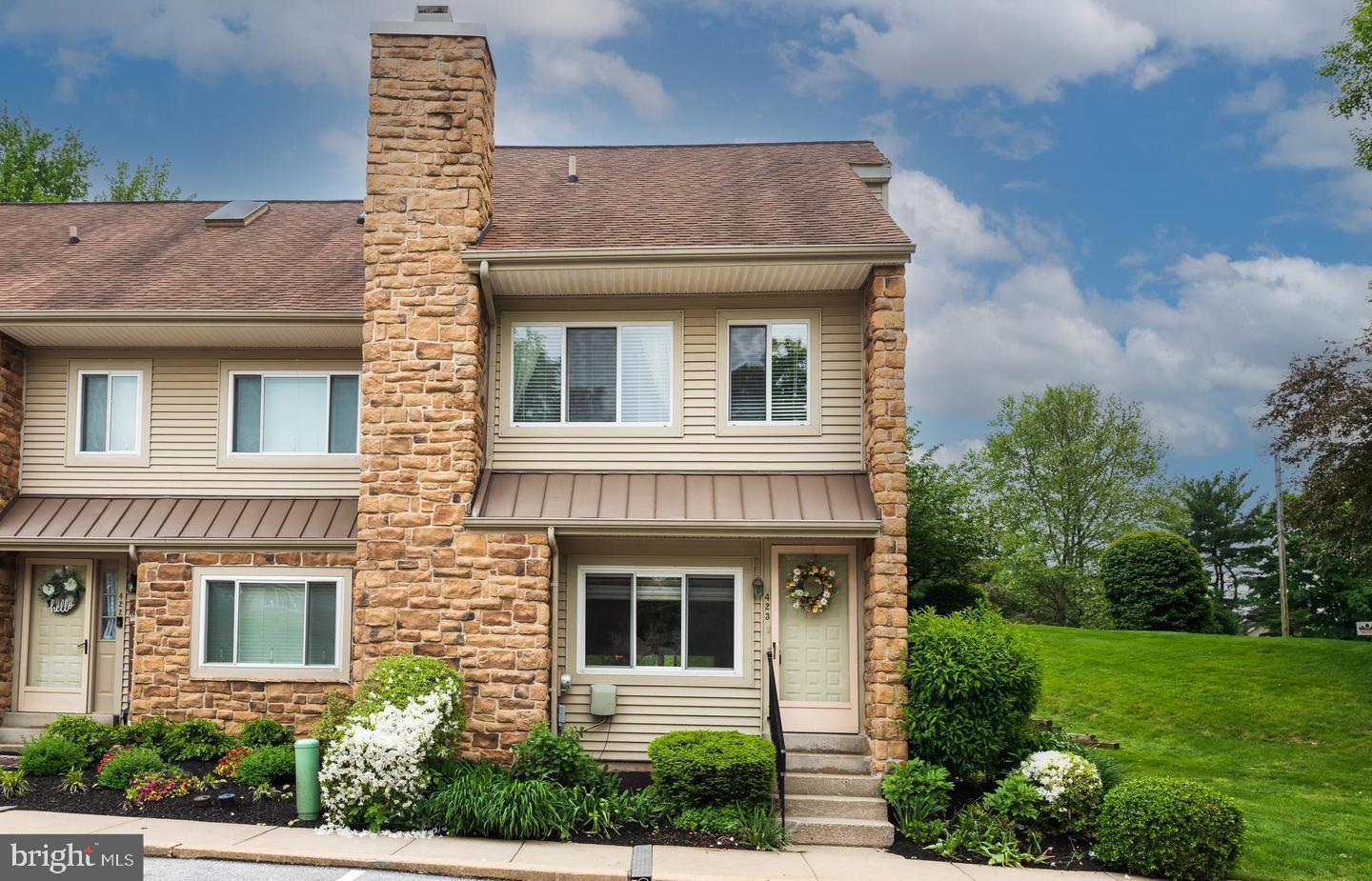 Welcome to 423 Cannon Court, an elegant end-unit townhome nestled in Chesterbrook's coveted Paddock neighborhood. Located in the Top Ranked Tredyffrin-Easttown School District, among the top 3 schools in the country! This beautifully updated home boasts three inviting levels, providing ample space for family and friends. This home features an open-concept main level with a living room, wood-burning fireplace, and spacious kitchen with tile flooring, raised panel cabinetry, and dining island! The flexible family room/dining area has sliding glass doors to the rear deck! A half bathroom and storage closet complete the first floor. The second level features a serene owner's suite with private balcony access, a luxurious en-suite bathroom, and ample closet space. Don't miss the enclosed laundry area in the second floor bathroom, with the washer and dryer conveniently located and tucked away within a cabinet. A second bedroom and convenient laundry area complete this level. The top floor offers a tranquil retreat with a spacious third bedroom, sitting area, and full bathroom! Perfect for a primary suite or guest retreat. The rear patio is perfect for outdoor relaxing and entertaining. Additional features include recessed lighting throughout the home, ceiling fans, and great storage space! Enjoy proximity to Valley Forge and Wilson Parks, shops, and corporate centers. A fantastic opportunity in a great location! Schedule an appointment to view today!