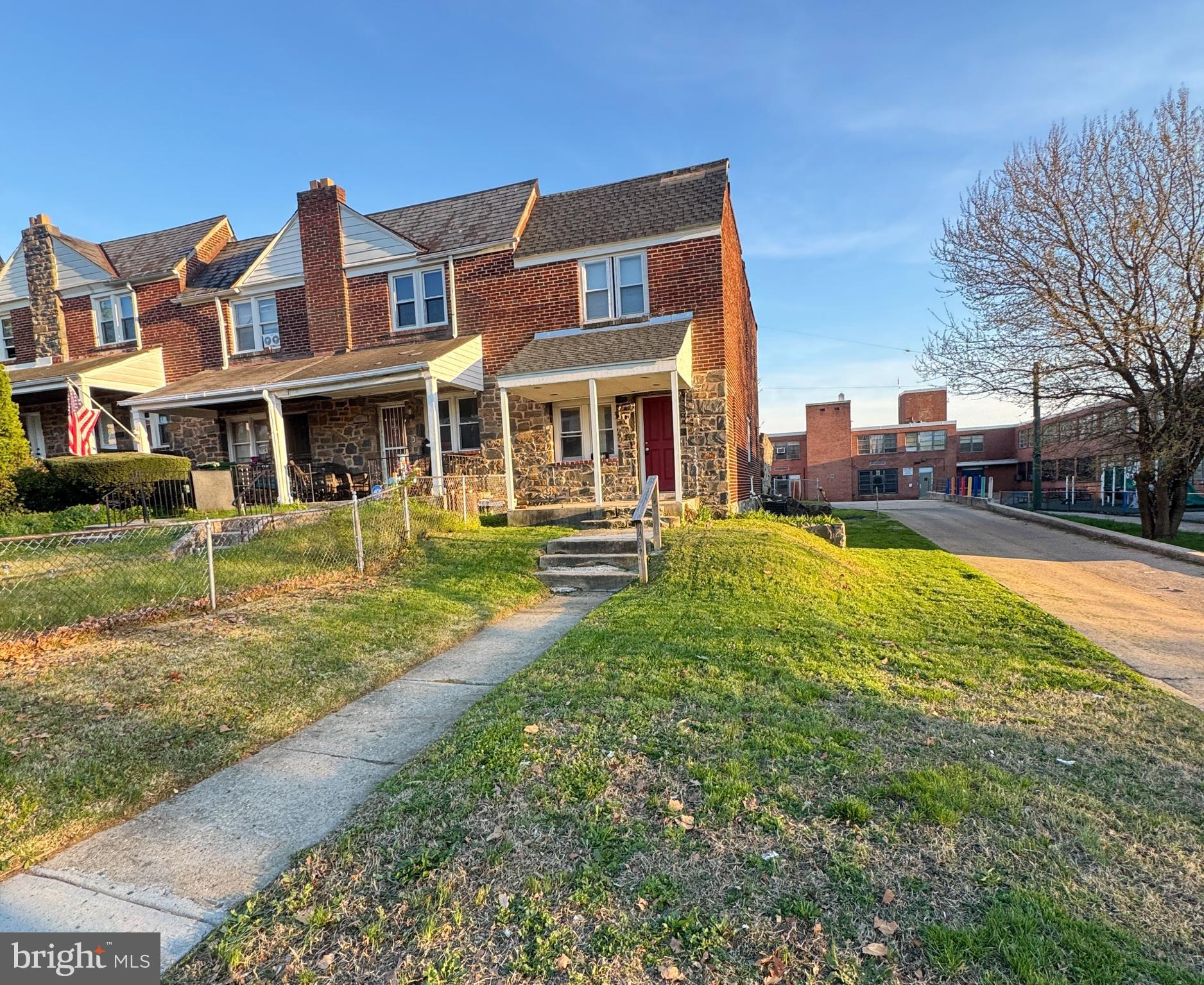 Discover this colonial townhouse nestled in the desirable Evergreen Lawn community. Built in 1942, this end-of-row gem boasts a timeless brick and stone exterior and inviting you into a welcoming interior that features an open floor plan with laminated flooring that flows seamlessly from the living, dining and kitchen areas. Natural light floods the home through double-pane windows, enhancing the inviting atmosphere. The kitchen, designed with a country flair and equipped with custom-made white cabinetry, granite countertops and appliances. making it an ideal spot for kitchen enthusiasts. Enjoy the comfort of three well-appointed bedrooms, complemented by a full bathroom with a tub shower and a convenient half bath for guests. The unfinished basement offers endless possibilities-transform it into a recreation room, home gym, or additional storage space. Outside, the corner lot features beautifully landscaped front yard and side yards, providing a serene outdoor retreat. Enjoy leisurely strolls along the sidewalks, illuminated by charming streetlights, creating a picturesque neighborhood ambiance. The location is convenient with easy access to local amenities, dining or restaurants and shopping center. Don't miss this wonderful opportunity to own a home with modern convenience and classic charm!