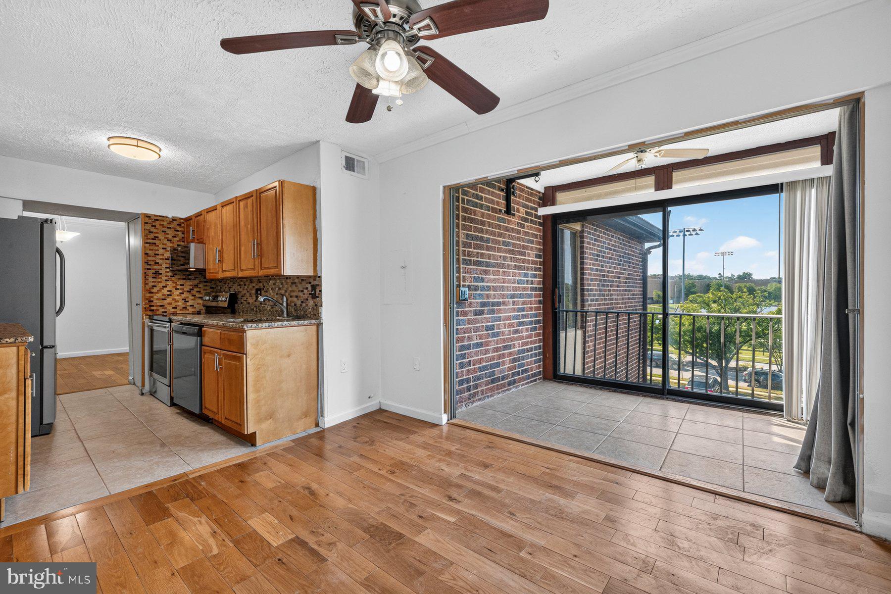 Beautifully maintained and move-in ready 3BR/2BA Condominium located in the quiet community of Greenbriar.  Park steps from the building entrance, then make your way to the third floor, and enter your new home.  Step inside a home filled with natural light, an open floor plan, and beautiful hardwood floors. The main living area offers a large living room that opens to an enclosed balcony, a spacious dining area, a laundry closet, and a kitchen. The kitchen features plenty of cabinets, granite countertops, a tiled backsplash, stainless steel appliances, and a pantry closet.  Down the hall are two sizable secondary bedrooms, a full bath, and a primary suite that offers two closets and a private bathroom. This move-in-ready home is ideal for any new homeowner and is located close to shopping, restaurants, and commuter routes.