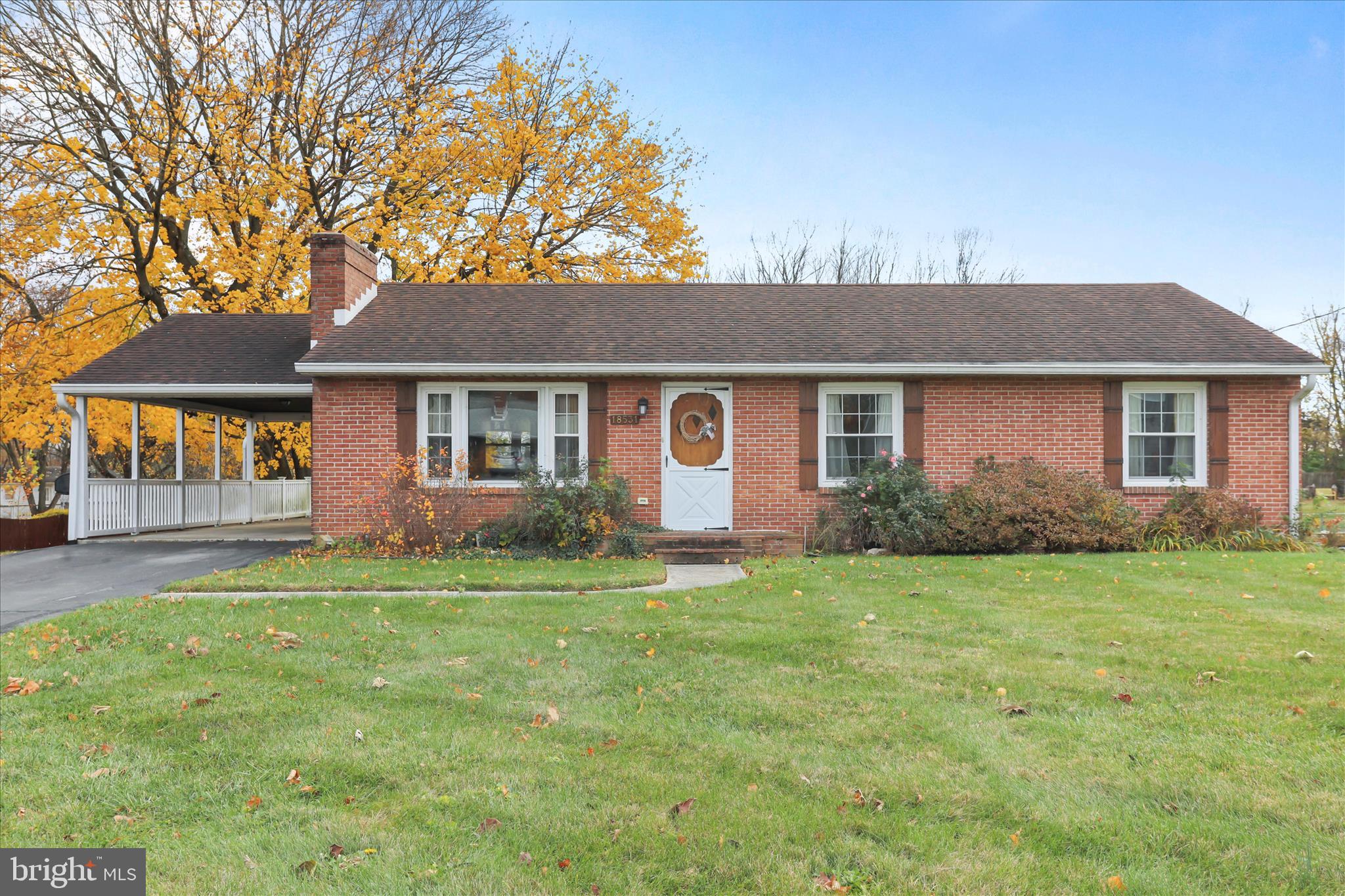 Welcome to our newest listing! This brick rancher feels bigger than it looks, with 3 bedrooms and 1 full bath on the main level and a large living room with fireplace. The kitchen offers table space plus an adjacent sunroom looking out to the spacious back yard. The basement has a finished room plus a full bathroom, as well as plenty of room for additional living space or extra storage. The basement is walk-out, and if a big back yard is what you seek, then you'll find it here. This home is a great opportunity for those who want to do their own updating and finishing touches, except for the windows--they've been replaced. Less than 2 miles from I-70, close to shopping and schools, and NO city taxes. Go check out this home today!