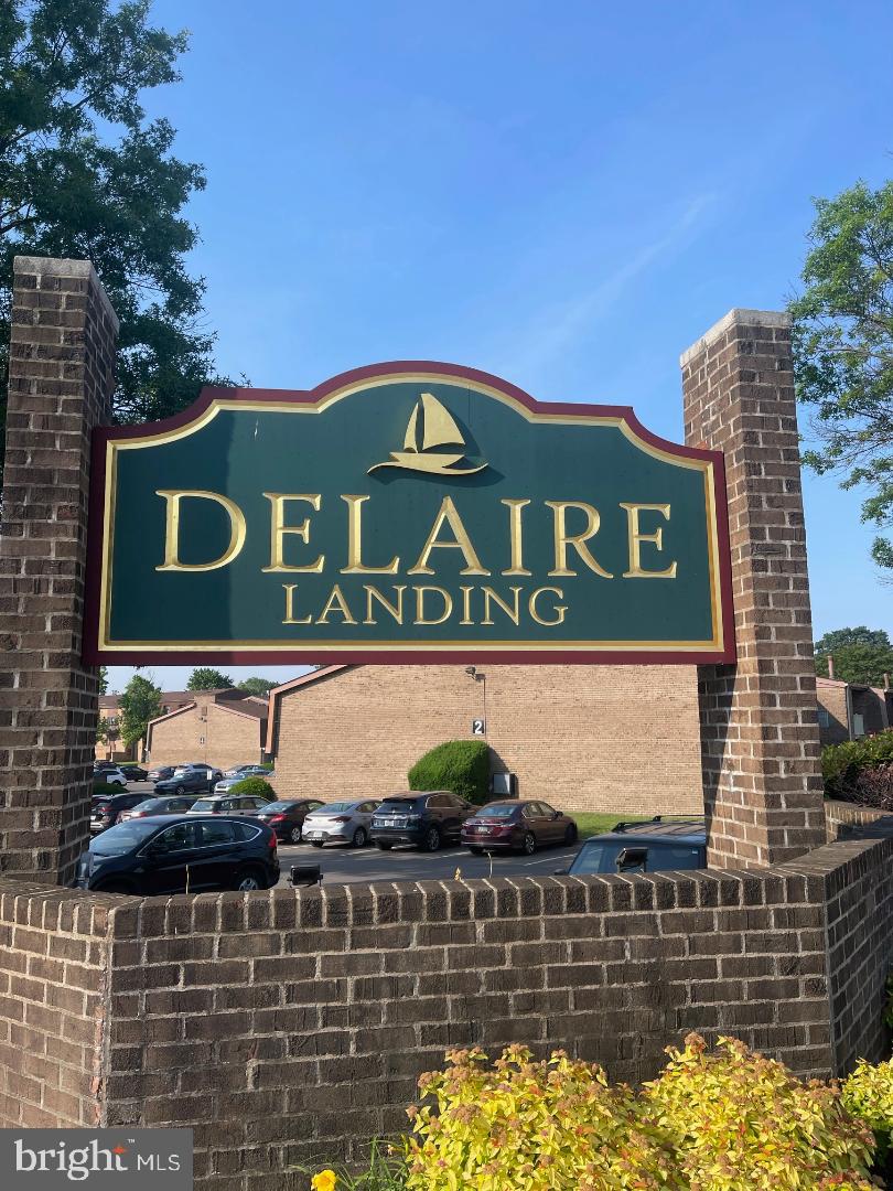 Welcome to Delaire Landing, a secure riverfront condominium community. Situated in Building 67, this top-floor unit offers two bedrooms and one-and-a-half bathrooms - In May, 2026 - the condo was freshly painted throughout as well as new carpets installed.   Upon entry, a spacious foyer leads to an expansive living room seamlessly connected to the dining area, enhanced by cathedral ceilings. The kitchen is equipped with wood cabinetry, stainless steel appliances, ample storage, and generous counter space. Access the private covered balcony (17 x 5) through sliding glass doors from the living room, providing an ideal setting for relaxation or morning coffee.  A powder room conveniently adjoins the living room, complementing a full hallway bathroom.  Two nice sized bedrooms with plenty of closet space;  the primary bedroom features a walk-in closet. Secure storage is available just outside your front door. The in-unit laundry area includes a washer, dryer, and additional storage, adding to everyday convenience. This third-floor condo is constructed with cement floors to optimize privacy and reduce noise.  Ample parking is provided directly outside the condominium. Association fees cover 24-hour staffed security, coded entry, basic cable, water/sewer, snow and trash removal, picnic area, playground, observation deck along the Delaware River, clubhouse, two swimming pools, two tennis courts, library, game room, exercise room, and designated party/meeting space. Residents enjoy scenic river walks, swimming, tennis, and more. The location offers easy access to I-95, Center City Philadelphia, New Jersey, and is within walking distance to regional rail, public transportation, Holy Family University, popular restaurants, shopping centers, golf courses, country club, and parks. Schedule your appointment today.