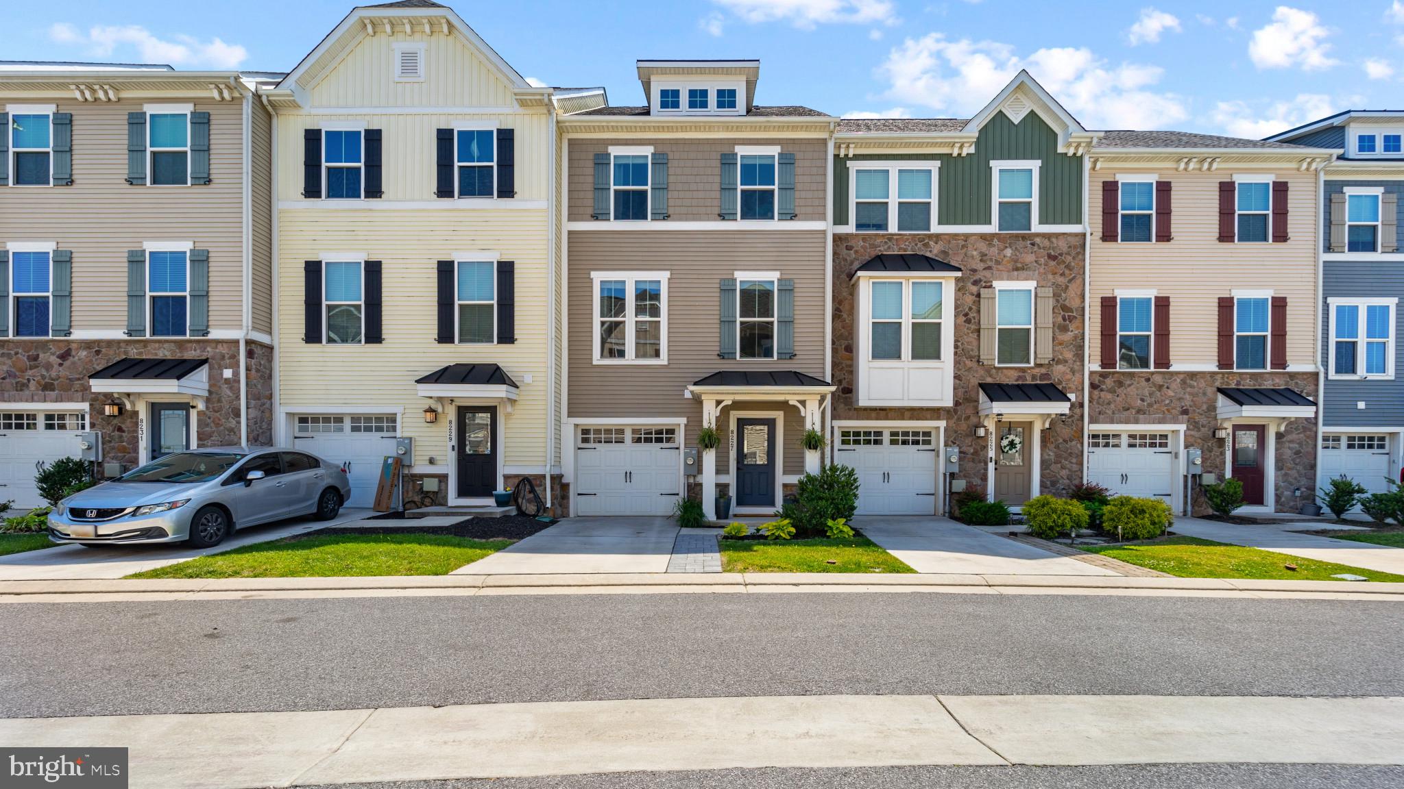Live your life in serenity and wake up to the blissful Bear Creek everyday. The community of Sheltered Harbor is tucked into Lynch Cove, and offers a peaceful place to call home. Entering through the front door of the townhome, you will find garage access to the left, stairs to the right and a powder room. Toward the back of the home you will find the den or recreation room. This large room on the main level can be used for entertaining especially since it has a walkout to the backyard and patio. This room has double doors where one can walk out into the patio joined by backyard and water views of the marina and Lynch Cove. Up the stairs into the second level there is a kitchen, dining area, and the living room in an open floor plan setting. Off of the back of the kitchen there is a large deck so that one can enjoy coffee in the morning or wine in the evening. Up another flight of stairs you will find three bedrooms and two full bathrooms. The owners suite bedroom, to the right, is on this third level and has a large bathroom for two. The second full bathroom can be accessed from the hall between the other two bedrooms. One of the bedrooms on the front of the home has water views of Lynch Cove.  A new dog park and board walk around the perimeter of the community are under construction and are coming soon. There is also a small Marina where you can park your boat or kayak for daily water activities. This isn't just a home, it is a lifestyle.