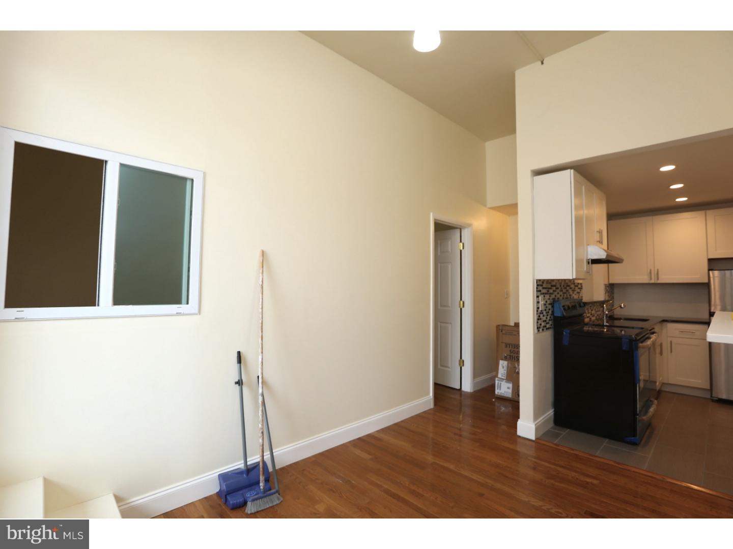 Newly renovated unit located in the heart of Rittenhouse Square is ready to go for immediate occupancy!  This unit has brand new kitchen with white shaker cabinets, stainless steel appliances and granite counters.  Brand new bathroom w/ new tile + fixtures.  Hardwood floors throughout.  High ceilings.  Formerly a large studio unit converted to a one bedroom.  Glass sliders lead to nice outdoor patio (rare for this area).  Located on Walnut Street, close to Upenn and Drexel, Rittenhouse Square, numerous bars, restaurants, cafes and Septa.
