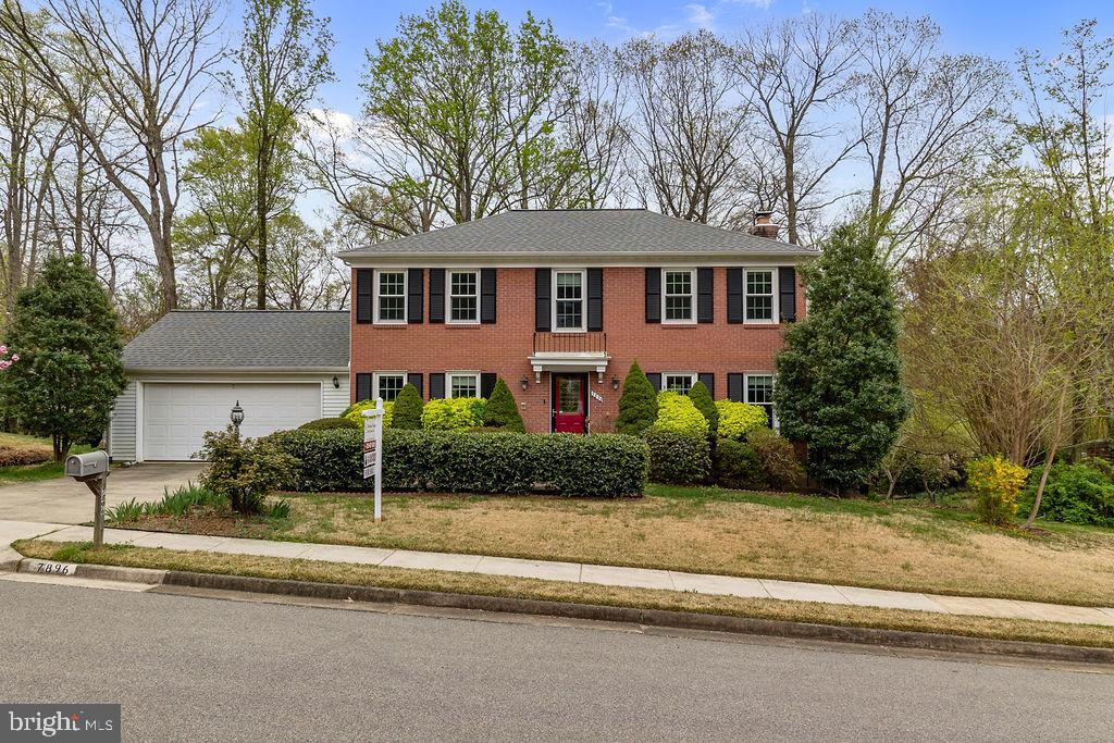 Welcome Home! Charming Brick Colonial with 2-Car Garage. Move in Ready! 
Discover this inviting 4-bedroom, 3.5-bath home nestled on a quiet street in a highly sought-after community.  Across from path to Park...very walk able.
Recent updates include BRAND NEW WINDOWS.......HVAC system, and a water heater (7 years) 
Gorgeous hardwood floors flow throughout the home, complementing the updated kitchen featuring a double wall oven and cooktop. 

The cozy family room, complete with a fireplace and adjacent powder room, creates the perfect space for relaxing. Sliding glass doors lead to an expansive deck with stairs down to a newly installed stone patio. The fully fenced .31-acre yard is a showstopper! Meticulously maintained by a former owner-landscaper and gardener, the outdoor space is truly spectacular.

The fully finished, walkout lower level includes an additional bedroom and full bath, offering ideal guest accommodations or flexible living space.

Prime Location for Commuters Situated near I-95, the Mixing Bowl, VRE, and the Metro, this home is perfectly positioned for easy access to Washington, D.C., Fort Belvoir, and the broader Northern Virginia area.

Outstanding Community Amenities -Residents enjoy access to a swimming pool, playgrounds, tot-lots, and excellent local schools. Nearby, the newly redesigned Springfield Town Center Mall boasts a movie theater, top-tier restaurants, and popular retail stores. Outdoor enthusiasts will love Lake Accotink Park with its mini-golf, fishing, paddle boats, and recreational activities. For golfers, Springfield Country Club offers a great place to hit the links, while Mike's Great American Restaurant remains a beloved local favorite.

Don’t miss the opportunity to call this exceptional property your new home!