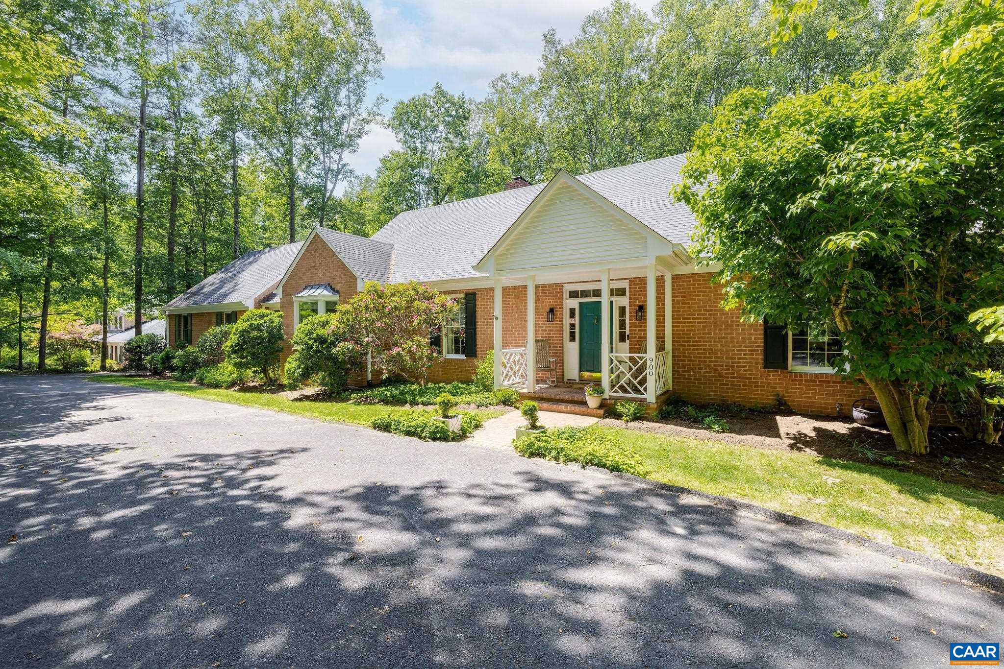 FLORDON // Tucked into a neighborhood of rolling hills, mature trees, and generous lots, this brick residence has it all! From the street it reads as an elegant one-story home. Step inside and the scale surprises you ? three finished levels, nine-foot ceilings, rich hardwood floors, and a circular drive setting the tone before you reach the front door. The main level delivers everything you need to live comfortably without using the stairs ? primary suite, laundry, two-car garage, and a seamless flow between formal and informal spaces. 3 fireplaces anchor the home with warmth. The sunroom is a favorite spot for mahjong and reading, the kind of room where people linger. The screened porch with vaulted ceiling and skylights is the room you can peacefully enjoy 9 months a year, all hours of the day and night. Upstairs, 3 generous BRs and 2 full baths offer space and privacy. The terrace level is pure bonus ? a perfect retreat for friends, plus a workshop, tons of storage, and a 4th full Bath. Minutes to Boar?s Head, Farmington, UVA, Crozet, and Downtown Charlottesville.  Flordon is ?that? neighborhood ? opportunities here are rare. This one is ready - come see what all the fuss is about! Attached: Floor Plans, Survey, History, etc,Soapstone Counter,Fireplace in Family Room,Fireplace in Living Room,Fireplace in Rec Room