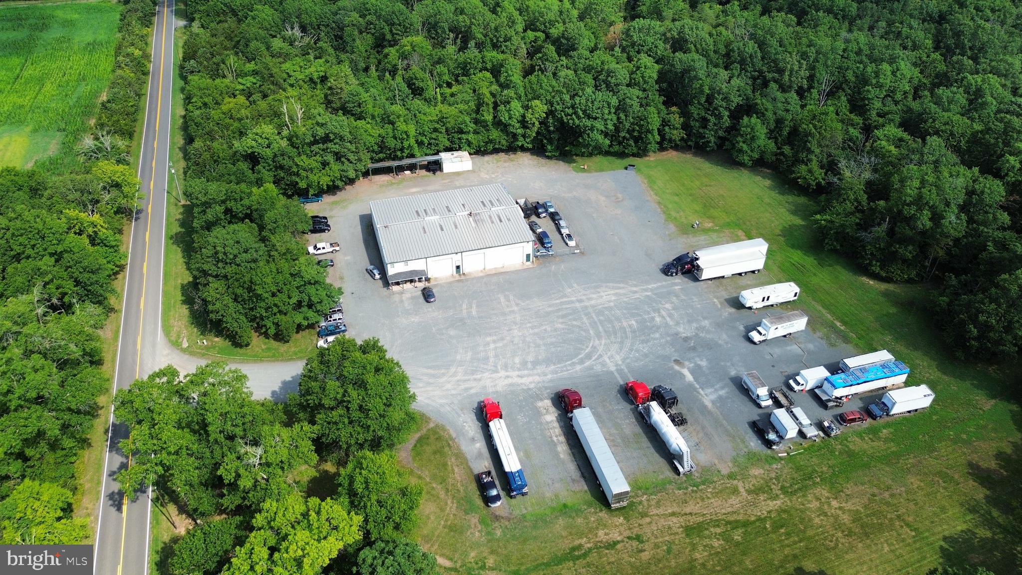 9,600 sf warehouse on 17 acres of I-1 (Industrial) and RA (Rural Agriculture) land in Remington, VA near US 28, US 29, and US 17. 9,692 SF warehouse includes five 14'x14' drive through doors, parts room and 2,000 SF of office buildout on well and septic with approximately 4 acres of graveled area.  984 feet of frontage on Lucky Hill Rd, which is built to an industrial standard that allows tractor-trailers to drive with ease.  GPINs : 6888-47-7651 & 6888-47-9105.  7 acres of I-1 (Industrial) Land and 10 acres of RA (Rural Agricultural) land.  There is an additional 34 acres of Industrial land available for sale that adjoins the Subject which has public sewer, fiber and 3 phase power.