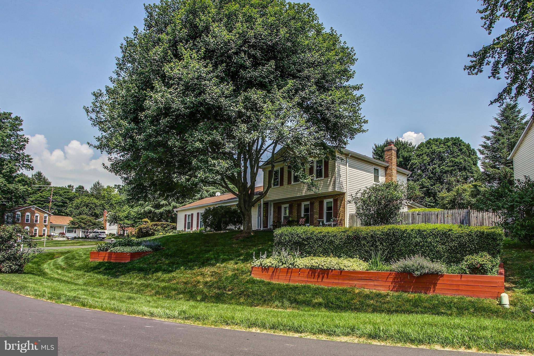 Super maintained split-level, NEW 2018: Electric Range, kitchen sink, faucets, ProVia front door & storm door, asphalt driveway, carpet in lower level, vinyl floor in sun room.  NEW 2017: A/C & gas furnace. Paint throughout. NEW 2015: fireplace steel liners & caps. Gutters & Gutter Helmets.  All double pained windows, hardwood floors in living, family & dining rooms. All closets w/ custom shelfing