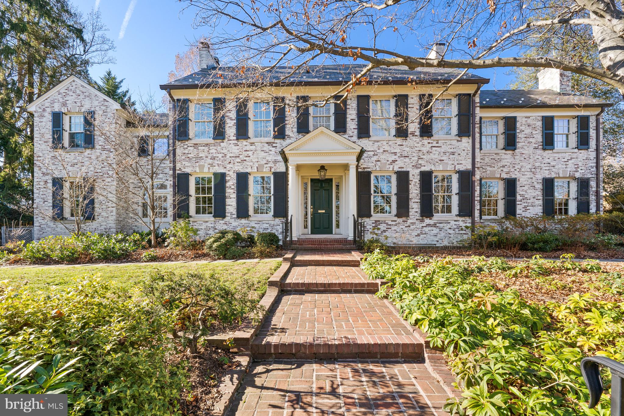 NEW PRICE! Privately appointed on an elevated 0.37 acre lot in the heart of Wesley Heights, 3024 44th St NW stands as a quintessential illustration of architectural grandeur, timeless design, and modern luxury. Boasting remarkably historic integrity, the 1926 limewashed brick Colonial features a seamless synthesis of ageless charm and updated amenities to include sprawling entertaining spaces, soaring ceilings, magnificent millwork, gleaming hardwood flooring, high-end appliances, and abundant natural light throughout its 4 levels and 7,900 total square feet. Breathtaking gardens, lush lawns and manicured landscaping encompass the expansive lot to provide utmost privacy and offer a serene escape within our nation’s capital. Showcasing an extravagant 6 Bedrooms, 5 Full Bathrooms and 1 Half Bathroom, this timelessly modern masterpiece is a true gem sited in a priceless locale. 
<br>
<br>
A brick pathway lined with lush greenery leads to the brick façade’s entryway, offering a peacefully warm welcome to the residence. The Main Level’s expansive entertaining spaces flank the entry foyer to include the Formal Dining and Living Rooms as well as the more informal Family Room and Study. Perfectly appointed in the rear of the residence’s Main Level, the Gourmet Kitchen and adjacent Butler’s Pantry are sure to delight any cooking enthusiast or avid host, boasting abundant marble counter space, top-of-the-line appliances and easy access to the breakfast and dining rooms. Featuring French doors leading to the rear dining terraces, al fresco gathering or year round poolside lounging  while overlooking the captivating gardens can be effortlessly enjoyed by all. 
<br>
<br>
The extensive Upper Level hosts an enviable Primary Suite oasis sure to enthrall any perspective owner. Debuting 10’ vaulted and cathedral ceilings throughout the spacious bedroom and adjoining sitting room, the sprawling suite features an enormous Dressing Room with 2 outfitted walk-in closets, a spa-like bathroom complete with dual vanity, soaking tub and steam stall shower, and a private balcony with garden views to top off the sweet respite. 3 additional Bedrooms, 2 Full Bathrooms, and a conveniently located Laundry Closet complete the Upper Level’s offerings. The Top Level showcases 2 guest bedrooms, each with gracious walk-in closets, a full bathroom, and a large attic/utility space. Offering abundant variability based on one’s needs, the Lower Level features a sprawling Recreation Room with Full Bathroom, abundant storage space and crawl space. A 2-Car Detached Garage completes the residence’s offerings. 
<br>
<br>
Boasting a timelessly curated and effortlessly expansive Wesley Heights masterpiece, this garden oasis offers the ultimate respite while providing the modern conveniences and luxuries of urban living in an unparalleled location.