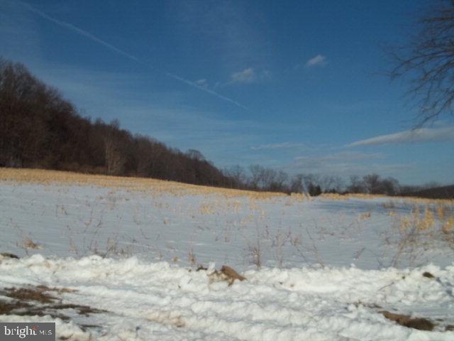 Some acreage is tillable (6 Acres), 15.43 is a mixture of woodland & fields.  Public road fronts much of the ground, un-perked, ridge borders to parcel of ground to the rear- Great location for building.