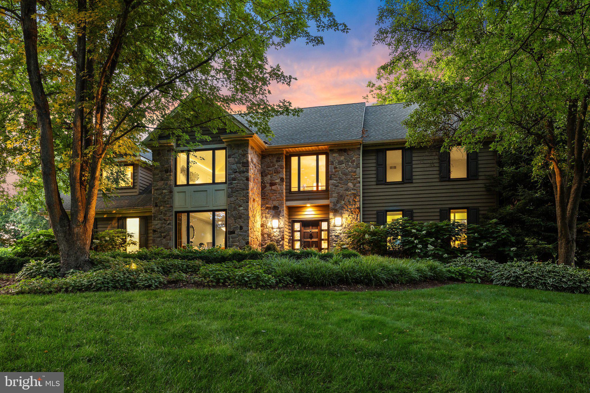 You would be forgiven for thinking that 3355 Lace Leaf in Doylestown is new construction! The current owners have meticulously cared for this home over the past 15 years with many upgrades and an undeniable care for every last detail in the home. This Bucks County suburban oasis offers modern amenities set amidst an extensive professionally landscaped garden.  With all new windows and HVAC in 2024, and a newer roof, the property offers a turnkey home for busy professionals who don’t wish to worry about maintenance. As you step inside this spectacular custom built home, you are immediately greeted with an elegant dining space to your left and an upgraded home office to your right. As you walk down the hallway you will be greeted by a second luxury office space and an expansive family room with high beamed ceiling.  The professional chef’s kitchen flows seamlessly from the family room creating a large open plan space suitable for families and entertaining!  With a large center island with built in cabinet space, a Wolf cooktop, expansive wine fridge, built-in coffee maker, and an oversized refrigerator, there is not much else needed for anything you and your family may wish to do. The rear of the home connects to a beautifully hardscaped patio and water feature through a glass nano wall which completely opens the space to the outdoors.  Completing the first level living is a 1/2 bathroom, Lutron programmable lighting, a custom designed laundry area, a custom designed mudroom, and a 3 car garage with built-in cabinet space, showroom style flooring, and multiple power sources. Heading up the contemporary designed stairwell, you will find 4 bedrooms and 2 full bathrooms. The master suite is complete with high vaulted ceiling, a large sitting area leading to a large walk-in closet.  The spa like master bathroom comprises a steam shower, soaking tub, custom built his and her vanities and sufficient custom cabinetry to allow you to store the important items you need to get ready for your day or to wind down from a hard day's work. To finish off this amazing interior living space is a finished basement with 1 full bathroom, a bonus room, wide open entertainment space with a sink and refrigerator, as well as additional unfinished storage space and meticulously cared for mechanicals. Last, but certainly not least, you will find this stunning Bucks County home surrounded by just under 2 acres of land that will blow you away. With a deck space connected to a pond with a mini waterfall, a patio with an outdoor kitchen, a pool with a 12 foot deep end and shallow areas for sitting, a vegetable garden, storage space for lawn equipment, a sauna, and the most beautiful landscaping, Lace Leaf cannot wait for the next owner to love the home for another 15 years. *VIRTUAL TOUR AVAILABLE*