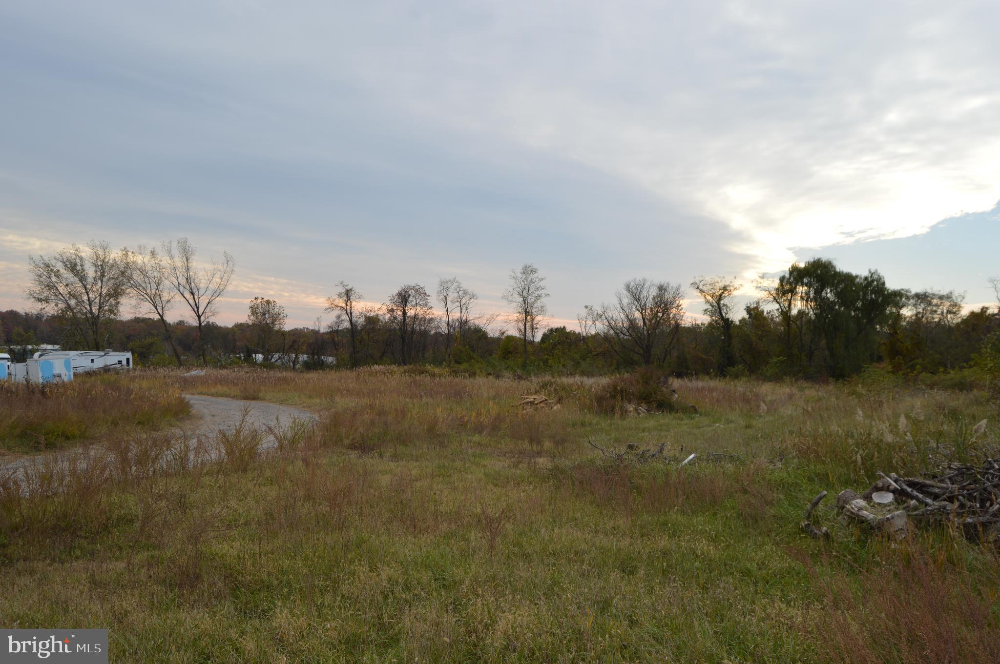 Fourteen Acres of W3 land, there is water to the site and fire hydrants. The access is gated with paved road and partially gravel Rd. This land is perfect for storage yards or any industrial use.