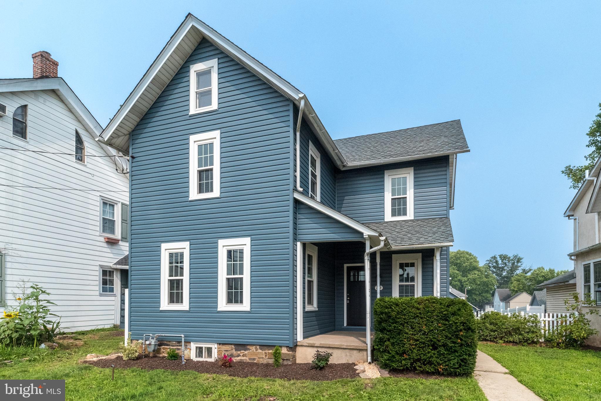 Step back in time without sacrificing modern comfort in this beautifully restored Victorian home, dating back to 1888 and located in the heart of the borough. Rich hardwood floors, classic built-ins, and timeless architectural details showcase the home's old-world charm, while thoughtful updates provide peace of mind for today's buyer.

The spacious floor plan offers generously sized, sun-filled rooms that create a warm and inviting atmosphere throughout the home. Featuring four bedrooms, one and a half updated baths, first-floor laundry, and a walk-up attic, there is no shortage of living space or storage. Recent improvements include a new roof, new siding, a brand-new natural gas furnace, and a new hot water heater.

Outside, enjoy a large yard fully enclosed by a brand-new vinyl privacy fence, creating the perfect setting for entertaining, gardening, or play. Off-street parking is conveniently located alongside the oversized one-car garage, complete with a workshop area and a second-floor walk-up loft for even more storage.

Ideally situated within walking distance to schools, downtown shopping and dining, and the local park, this charming Victorian offers the perfect blend of historic character, modern updates, spacious living, and everyday convenience.