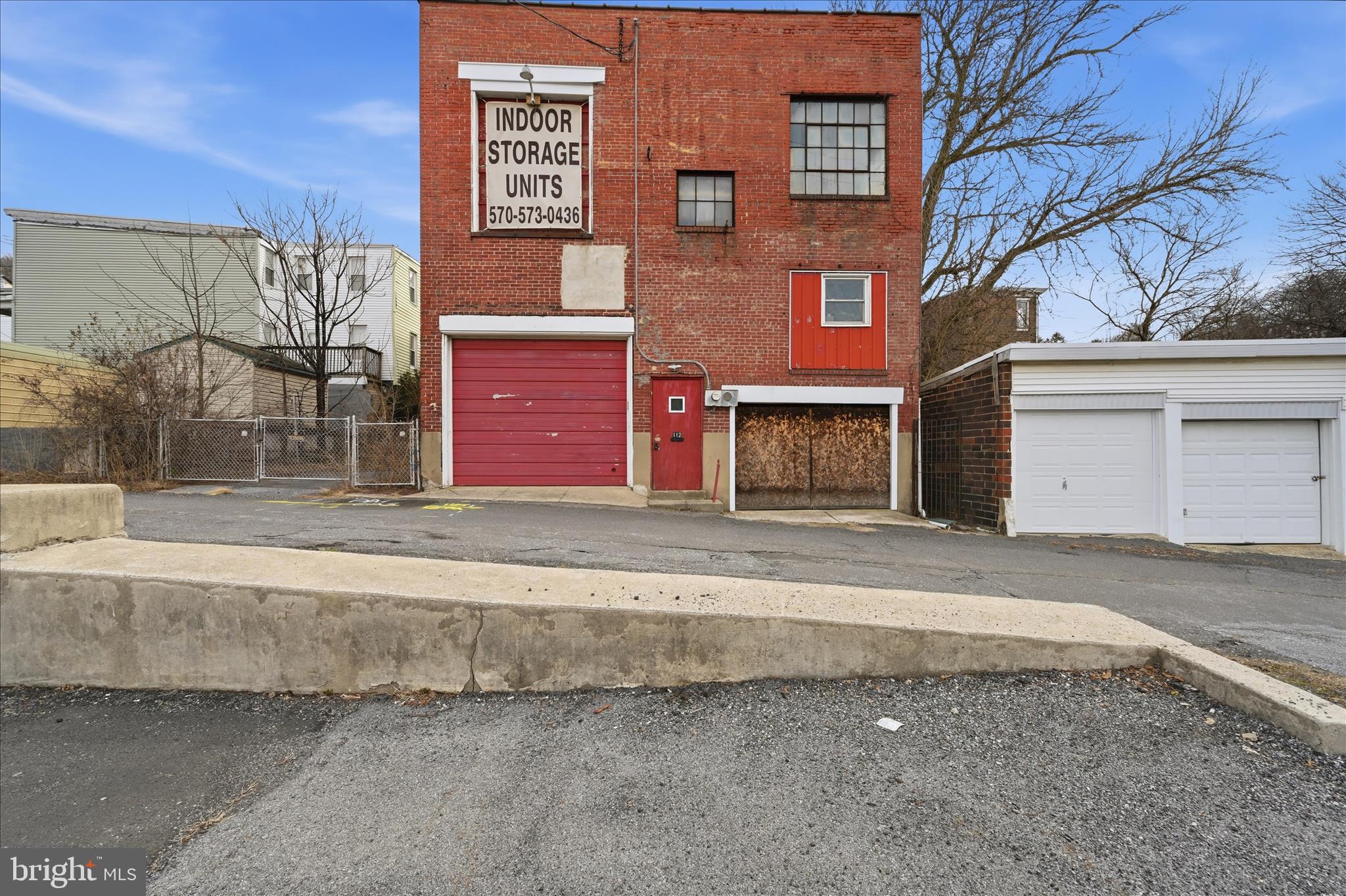 Prime investment opportunity in downtown Pottsville! This income-producing property features 15 fully occupied storage units, generating immediate and consistent cash flow. The property is approved for an additional 15 storage units, offering significant upside potential for future expansion. An on-site office space provides added rental income or operational convenience. Recent improvements include a brand new roof, minimizing near-term capital expenses. Ideally located with strong accessibility and visibility, this property presents a rare opportunity for investors seeking both current income and future growth. Schedule your private showing today for more details.