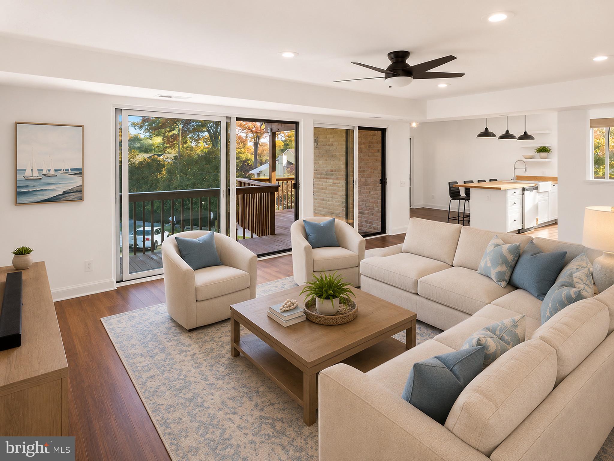 $ 25,000.00 PRICE REDUCTION --WELCOME HOME!This  beautifully Renovated Eastport Marina Condo with Deeded 30’ Slip A 54 & Waterfront Pool.This 3-bed, 2-bath end-unit condo in sought-after Severn House Condominiums blends coastal charm with modern luxury. Nearly every detail has been refreshed or rebuilt—new electrical, premium hardwood flooring throughout, added in-unit laundry, and a fully renovated kitchen featuring butcher-block countertops, stainless-steel appliances, gas range with vent hood, built-in microwave, and designer recessed lighting throughout the home. Custom built-ins include a butler’s pantry and laundry cabinetry for smart, hidden storage.A full wall of sliding glass doors opens to a spacious deck offering peaceful seasonal views of Back Creek. The residence also includes a large deeded basement storage unit.Enjoy exclusive ownership of a deeded deep water 30+ foot boat slip—one of the few in Annapolis with direct vehicle access, allowing you to drive right to the dock for easy loading and unloading.Located in the heart of Eastport, Severn House offers a waterfront pool, beautifully maintained grounds, and the area’s most protected deep-water marina. Sidewalks lead to Downtown Annapolis, the U.S. Naval Academy, and the city’s famed restaurants and shops.This turnkey waterfront condo perfectly balances luxury, comfort, and location—schedule your private showing today.