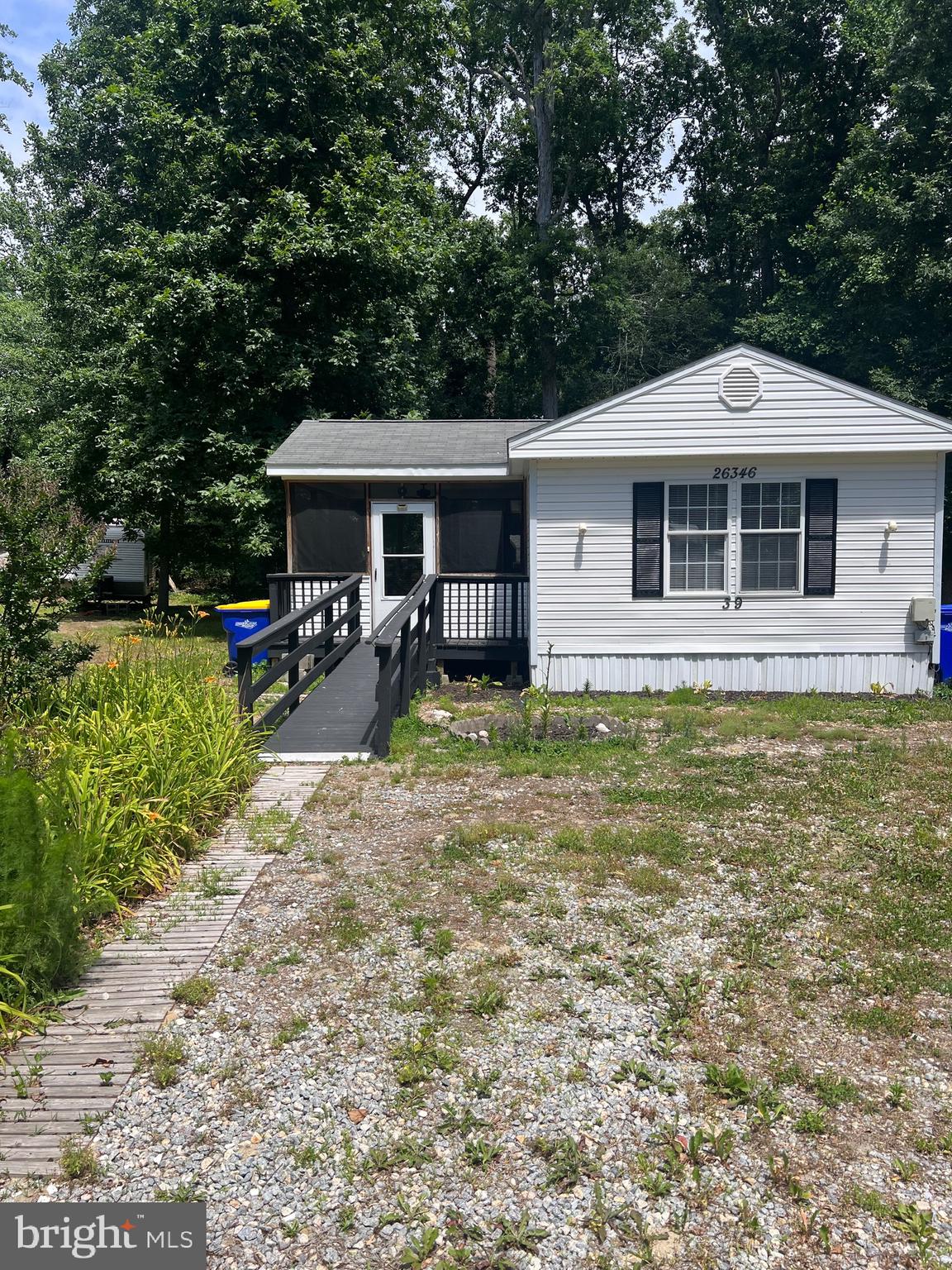 Nestled in the quiet community of Paradise Point, this charming 2-bedroom, 1-bath home offers quaint coastal living with updated vinyl flooring, newer countertops, a spacious back deck, and a large screened-in front porch perfect for relaxing. After a day at the beach, enjoy the convenience of the outdoor shower and three storage sheds, including one with electric.
Located just minutes from shopping, gas, grocery stores, and a variety of restaurants, the home is only 3 miles from White House Beach and within 30 minutes of Tanger Outlets Rehoboth Beach and the Rehoboth Beach Boardwalk. Schedule your showing today to see this quaint gem!
