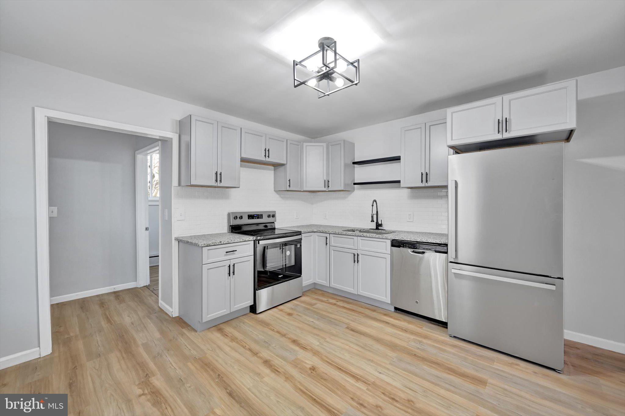 This beautifully remodeled 4-bedroom, 2-full-bath single-family home is the perfect blend of modern updates and timeless charm—and it’s calling your name! From the moment you step inside, you'll be greeted by lots of warm natural light and a thoughtfully designed floor plan that makes you feel right at home.  The bright and airy living space offers plenty of room for relaxation or entertaining. The beautifully updated kitchen has sleek countertops, stylish cabinetry, and ample space to prepare your favorite meals. With a first-floor laundry room, chores become a breeze.  Convenient first floor bath with a walk-in shower is a must have with today's busy lives.  No more waiting for your turn.  The 3 rd bedroom has a bonus room perfect for home office, gym or your DREAM CLOSET!  Let's not forget the full basement is brimming with potential. Step outside to your fully fenced backyard—perfect for those summer BBQs, gardening, or simply unwinding after a long day. The oversized one-car garage not only offers parking but storage for your Boat, ATV or any toys you need to store. The attached shed provides a great space for tools, outdoor gear, or seasonal decorations. Located just minutes from I-81, commuting to Highridge Industrial Park, Hazleton, Wilkes-Barre and Harrisburg  making it a quick and easy commute. Whether you're a first-time buyer, upgrading your lifestyle, or seeking a smart investment opportunity, this home is sure to impress. Don't let this gem slip away—schedule your private showing today! Call now to see this incredible home before someone else claims it as their own.