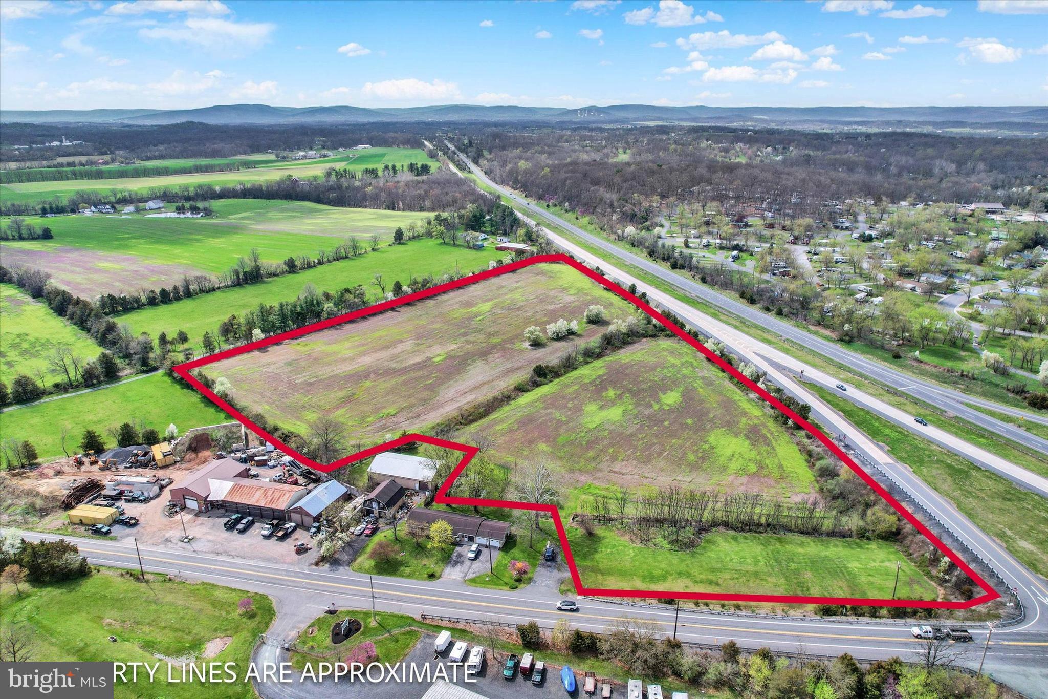 ZONED VILLAGE MIXED USE (VMX)  12.47 AC, already enrolled in Clean and Green.   Clear & relatively Level land with a variety of possible uses.   Located at the intersection of US Route 15 and PA Route 134 (Taneytown Road).  EXCEPTIONAL location for maximum exposure.  HIGH TRAFFIC VOLUME along Southbound US Route 15.  Some permitted uses are Professional Offices, Multi-Family Dwellings, Single Family Dwelling, Forestry, and Essential Services.  Part of the gravel driveway on Taneytown Road is part of this property.  No official perc testing recorded.  Schedule your showing today and bring your ideas!