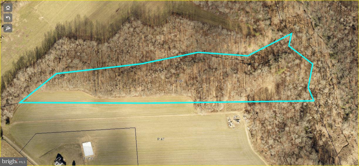 Beautiful 12.64 +/-  acre Parcel in a private Country Setting!  This lot is located in the Rural Tier of Prince George's County, with five operating vineyards within 8-14 minutes of this property, five minutes to the Merkle Wildlife Sanctuary, seven minutes to the Patuxent River Park. This is a corridor that has incentives for  large Conservation Easements to help maintain the area's rural character. OS Zoning (Open Space)  allows for only one dwelling unit per 5 acres minimum. Percolation test APPROVED!  Possible Subdivision potential.  Part of the property subject to critical area guidelines if subdivided.  LISTING AGENT MUST ACCOMPANY ALL SHOWINGS!