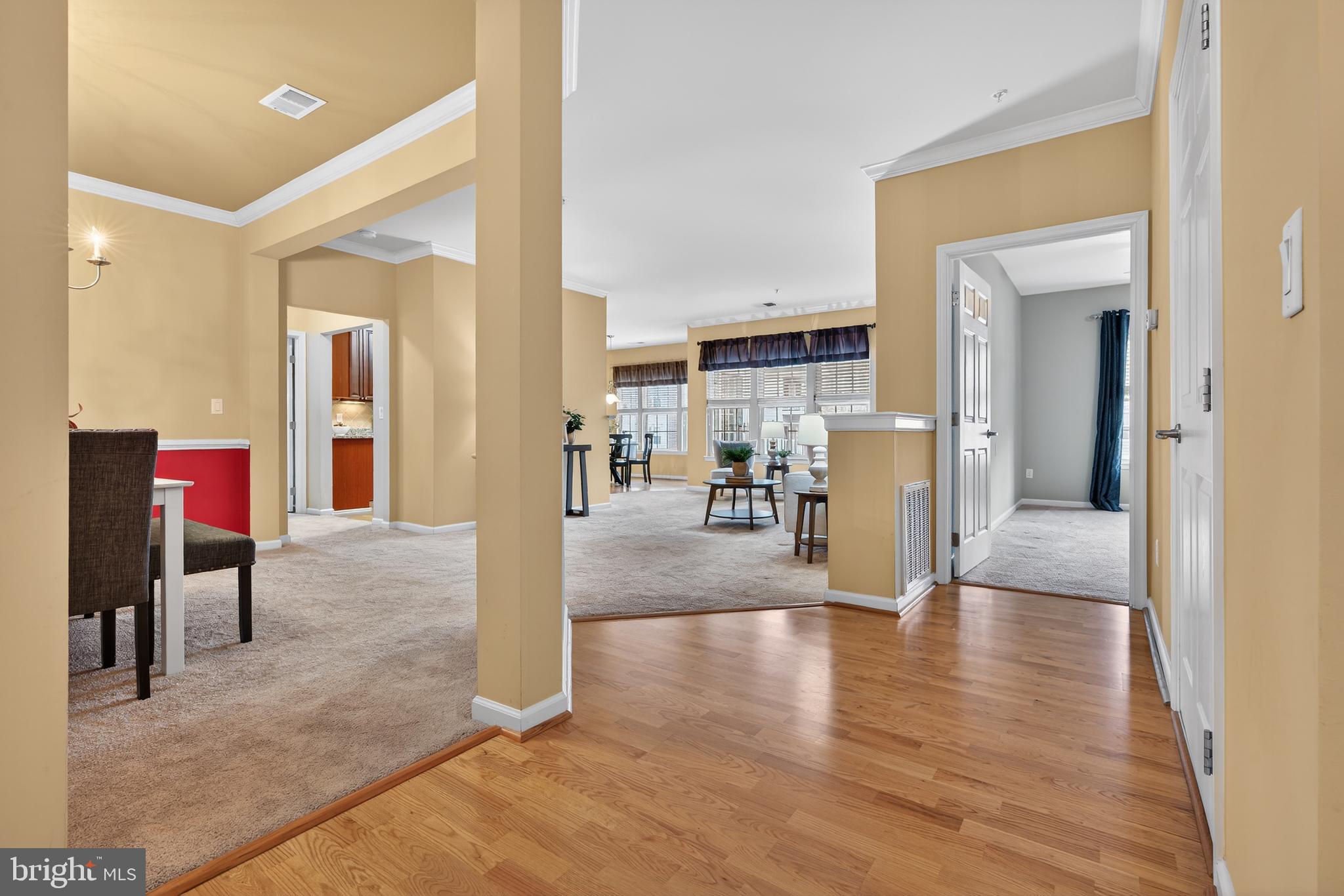 Welcome home to 55+ luxury living in the sought after community of Waverly Woods. This condo offers maintenance-free living & a vibrant community suited to fit many lifestyles. Featuring an inviting open floor plan, the unit offers 2 bedrooms & 2 full baths in very good condition. Walking in the front door is so welcoming with the large living area that opens to the dining room, & kitchen with great natural light. The eat-in kitchen features beautiful cherry cabinets, granite counters & wood floors.  The primary bedroom includes a large seating area great for an office or reading space. There is also a walk-in closet & attractive bathroom with double sinks, a walk-in shower with a bench, & pretty tile work. The second bedroom is also spacious and the 2nd bathroom includes a bath tub & attractive tile work.  You'll also love the porch off the kitchen that can fit a table & chairs or other furniture. Also, the water heater was replaced in 2024. The carpet was just professionally cleaned.
Residents of this well-maintained 55+ community love the variety of amenities, including an in-ground pool, pickleball/tennis courts, bocce ball court, clubhouse, fitness area, gazebo, walking paths, & electric vehicle station.  There are many welcoming get togethers & parties. A community shopping village with grocery & liquor stores, restaurants, gas station, etc., is less than 5 minutes away. Come take a look!
Please note: Cash or Conventional loans only. Not approved for FHA or VA.