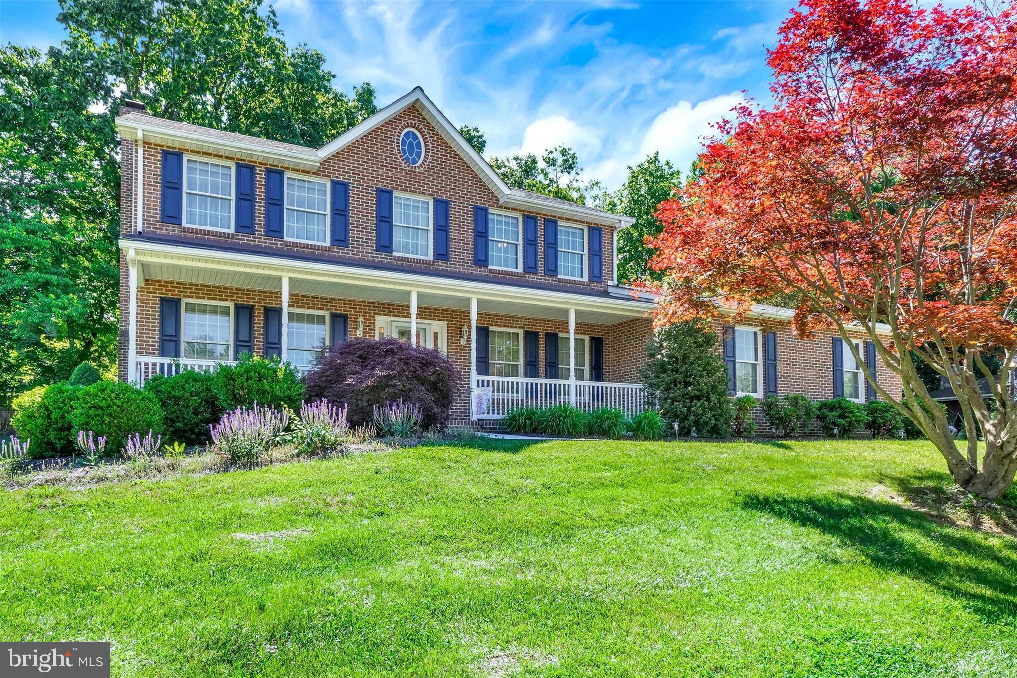 Welcome to 30 McCurley Drive, New Freedom, a stately, brick-front colonial in desirable Stone Ridge East, a quiet street of well-kept homes located just a few minutes to the MD line!  This home has been lovingly maintained by the original owners, is in immaculate condition and even has a brand-new furnace!  The traditional floor plan features an open concept main level specifically designed for large family gatherings, including a large kitchen with adjacent breakfast room, as well as a formal dining room for those holiday dinners.  The sunken family room with cozy gas fireplace will be your favorite place to relax, and the formal living room just off the entry foyer is a great place for a home office.  Upstairs you will find a spacious primary suite with huge walk-in closet and deluxe ensuite bath, creating a haven of relaxation at the end of a busy day.  Two additional generous bedrooms and a full hall bath complete the second floor.  The unfinished lower level offers an additional 1322 s.f. of possibilities for additional living space or just extra storage.  Outdoors you will find a private back yard with a 14 x 20 patio, accessed by French doors from the breakfast area.  This spot is perfect for cookouts or even sitting by a firepit!  The inviting front porch welcomes your guests and also provides additional outdoor living space.  This gorgeous home is situated on nearly a half acre lot in just minutes to I-83 for an easy commute to Baltimore or Hunt Valley.  Experience all that the small town of New Freedom has to offer, including access to the Heritage Rail Trail, carnival and festivals, Christmas Parade, as well as dining options and breweries.  Don't miss this one!