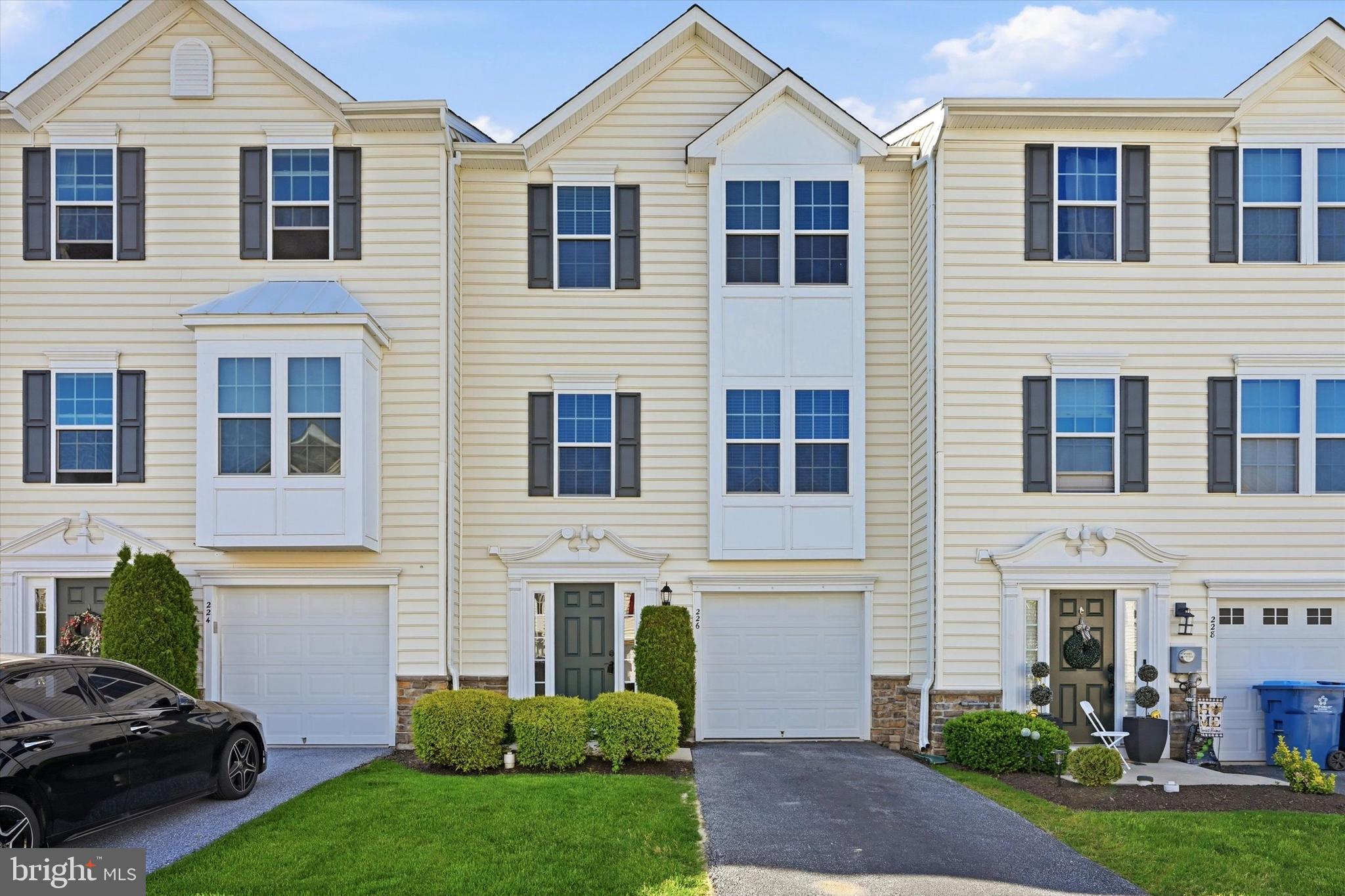 Meticulously maintained 3-bedroom, 2.5-bath townhome in the desirable Round Hill community, offering approximately 1,380 sq ft of thoughtfully cared-for living space plus a finished lower level with walk-out access. Pride of ownership is evident throughout, with every area of the home exceptionally well kept and maintained with great attention to detail. The main living area features an open layout filled with abundant natural light, a spacious living room, and an eat-in kitchen. The primary suite has both a walk-in closet and an attached bathroom with a soaking tub, separate shower, and double vanity. Additional highlights include central air, gas heat and an attached garage with inside access. Although built in 2012 there have been numerous upgrades made to the property including an entirely new AC unit (2021),  hot water heater (2024), refrigerator(2025), microwave (2026) radon fan and manometer (2026) and a fresh coat of paint at the end of May.   Enjoy community walking trails and playgrounds, all while being just minutes from shopping, dining, major routes, and regional rail access.