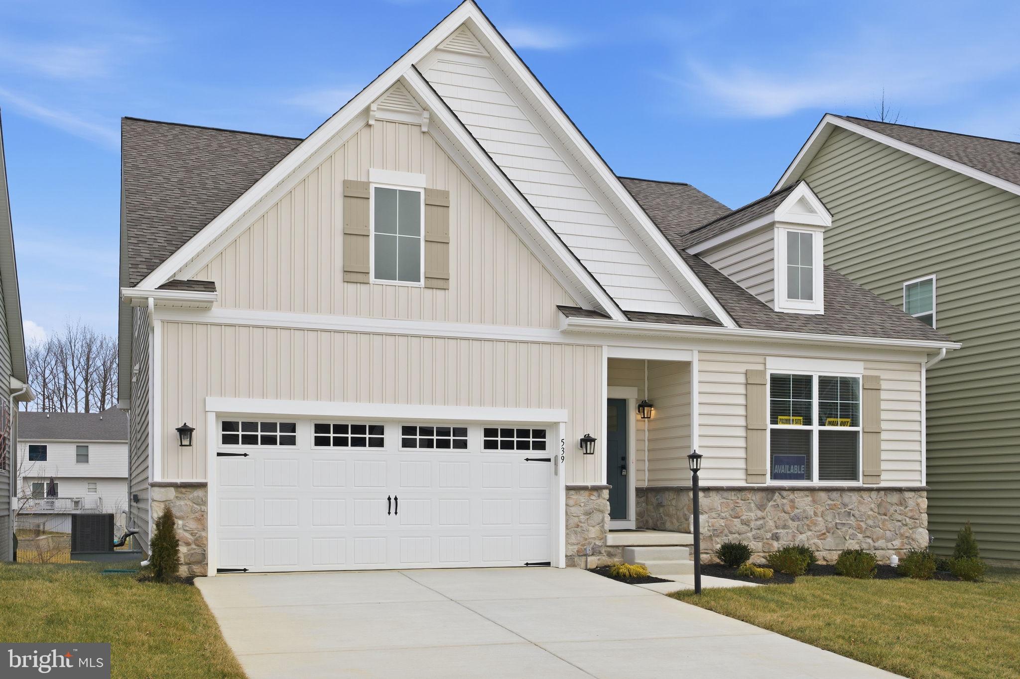 Immediate move-in opportunity in Bulle Rock! This 100% complete Patton floor plan offers luxury, flexibility, and modern rancher-style living while backing to open space and a protected forest retention area. Designed for both comfort and functionality, the main-level owner’s suite features a 2-foot extension, adding valuable square footage and enhanced livability.

The interior showcases high-end finishes throughout, including a gourmet kitchen with elegant quartz countertops, premium cabinetry, and a seamless open-concept layout that flows effortlessly into the dining area and extended family room. The family room is anchored by a stunning stone gas fireplace, creating a warm and inviting focal point. Premium flooring and hardwood floors extend throughout the entire first level.

This home also includes the optional second floor, offering two additional spacious bedrooms and a full bathroom—ideal for guests or flexible living arrangements. The full unfinished walkout basement includes a plumbing rough-in and opens to the backyard, providing endless possibilities for future expansion such as a home theater, gym, or additional suite.

Finished with a sophisticated neutral exterior color palette complemented by timeless stone accents, this home is located in the sought-after Bulle Rock community, where residents enjoy a resort-style lifestyle in one of Maryland’s premier golf course communities. The HOA provides lawn care and snow removal and grants access to a state-of-the-art fitness center, tennis courts, pickleball courts, and miles of scenic walking and biking trails. Incredible opportunity at a great price here at Bulle Rock!