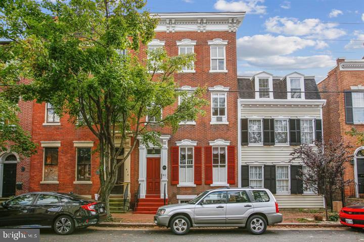 Enjoy living in the heart of Old Town Alexandria**Walk to shops, restaurants, zip car, bike share, King Street METRO, the King Street Trolley and the parks along the Potomac Riverfront**Just 1 block off of King St, this charming 1 BED 1 BATH apartment on the 2nd floor of an historic townhome features high ceilings, tall windows, gleaming hardwood floors and a wall of built-in storage in the Living Room**Bedroom features another floor to ceiling closet and an ensuite bath**Compact kitchen includes gas range, refrigerator and a dishwasher**Solar Shades are on all the windows**Common laundry in the basement is shared by the tenants**Rent includes heat, hot water & trash, tenant pays electric and gas for stove**Available now **NO pets, NO smoking**Minimum 1 yr lease**Perfect for an in town pied-a-terre**