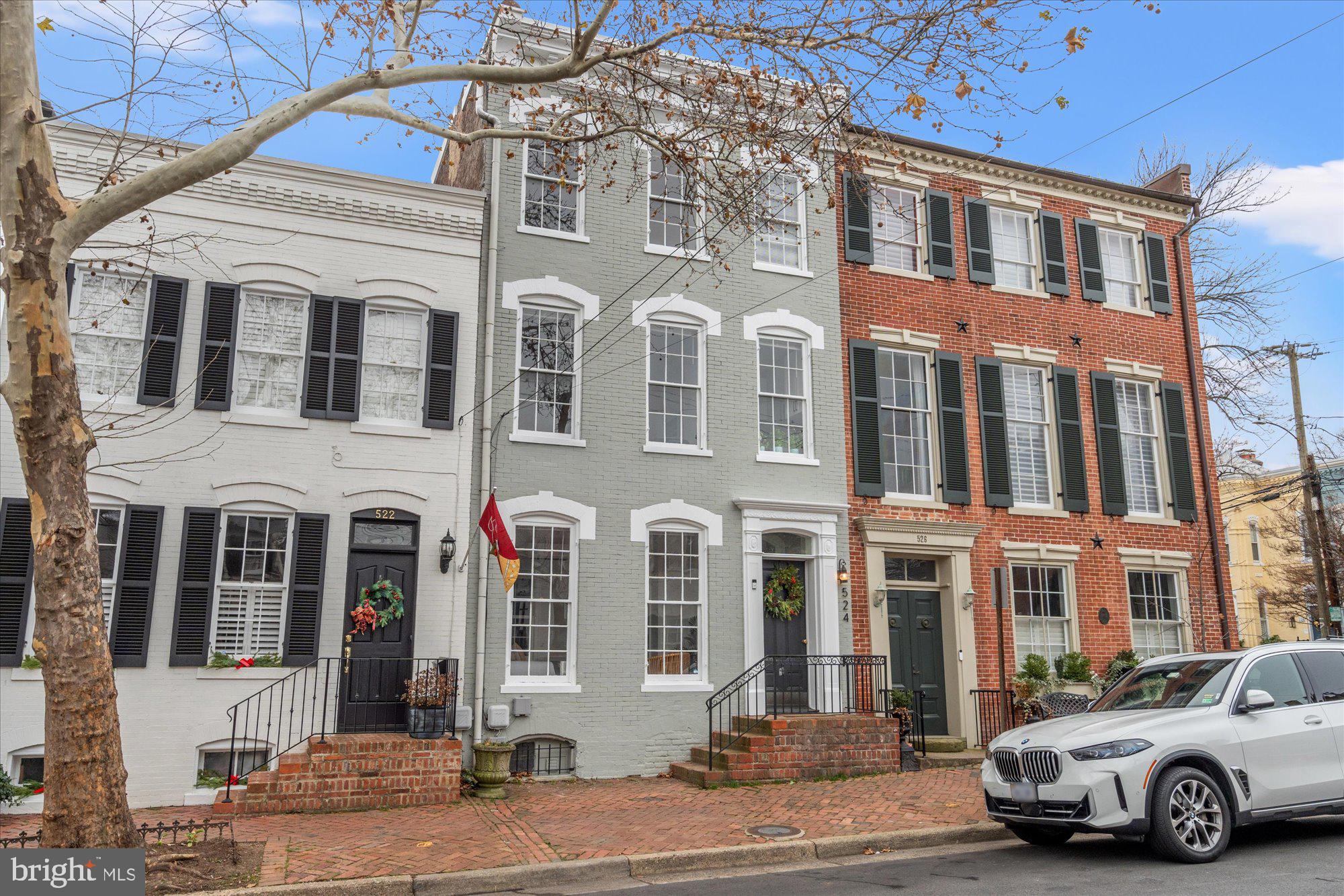 Rarely available, fully renovated, 4-unit, multi-family historic townhouse in the heart of Old Town. 2 blocks from King St & 5 blocks to the Waterfront. This amazing investment opportunity is perfect for the investor who would like to rent all 4 units, or someone who needs a pied-a-terre while renting the other units, or for the investor who wants to Air BnB all or some of the units. This light filled property features a JR 1br studio, two 1br units & a lovely 2br/2.5ba, two level unit with gas fireplace & private patio. All 4 units have been updated to have new kitchens & new baths. Painted from top to bottom. Other features include the original wide plank wood flooring, all of which have been refinished, newly added recessed lighting throughout & high ceilings.  Newly added mini-split systems to unit 1, 2, & 3.  Unit 4 is serviced by a separate heat pump distribution system for heating & cooling. There are two water heaters (replaced in 2021 & 2023) that service the building. In the basement you will also find assigned storage for each unit & two laundry centers to be shared by units 1, 2, & 3; while unit 4 has its own laundry stack. Don't miss this exquisite opportunity!