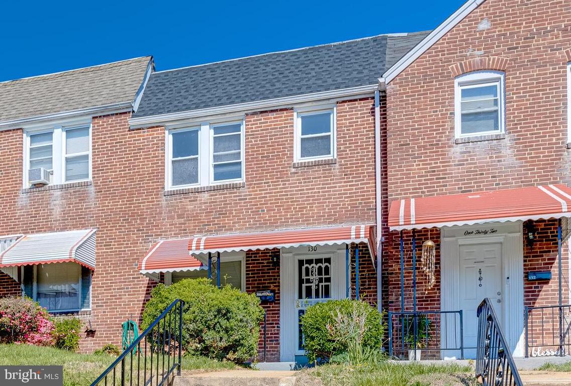 BEAUTIFUL RENOVATION JUST COMPLETED! Welcome to your new home! This stunning 3-bedroom brick townhome in Allendale boasts over 1,700 finished square feet of living space. You'll love the beautiful new flooring and soft paint palette throughout. A beautiful foyer opens up to a sun-filled living room with a classic and elegant feel. The main level open-concept floor plan features a chef's dream gourmet kitchen with stainless steel appliances, quartz countertops, ceramic tile backsplash, open to the dining area, and access to the rear parking pad. The upper level features all 3 bedrooms. The fully finished lower level provides even more space to spread out and relax, with plenty of room for a media room, home gym, or office. The lower level boasts a laundry area with a new washer and dryer. The parking pad with fencing on either side and rear access provides additional privacy and security. This home is located in a neighborhood with easy access to shopping, dining, and entertainment. Take advantage of the opportunity to make this beautiful renovation your new home!