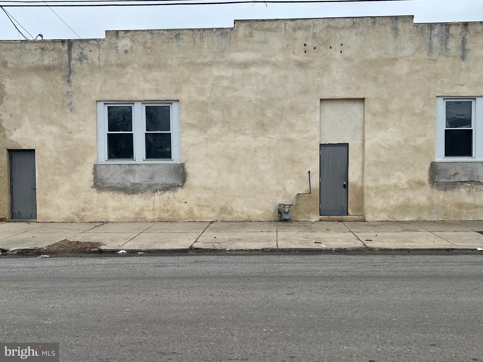 Motivated Seller bring All Offers. Prime Commercial Opportunity.  7,680 sq. ft.  warehouse space on a corner lot. This property can be used for many different business ventures. The building's solid construction and expansive dimensions provide a versatile canvas for anyone looking to establish or expand their operations. Whether you envision a creative studio, or dynamic service center, this property accommodates various commercial uses with ease. Its corner lot positioning enhances visibility and ensures convenient access for clients and customers. Located in a peaceful block, the property offers a quiet working environment while benefiting from proximity to the city's main thoroughfares, connecting you effortlessly to the wider community and beyond.  Don’t miss out on this exceptional property, schedule your showing appointment today. In 2019 a new roof, concrete slab floor and new windows were installed.*****Owner will reinstall 3 garage doors 1 in the rear of building(10 X 12) and 2 in the front of building  (8 X 8).*****