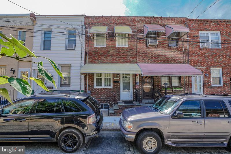 Amazing renovation by experienced developer in emerging Port Richmond. Surrounded by new construction. Come see this adorable brick front 2 bed 1.5 bath. New kitchen with glass backsplash and granite countertops. Black stainless steel appliance package with refrigerator, dishwasher, microwave and range. Luxury vinyl flooring and carpets cover the stairs landing  and basement. News roof, HVAC ,and windows.  All new interior and exterior doors. Ceiling fans with remote. New tile custom bathroom. Cement yard in rear.