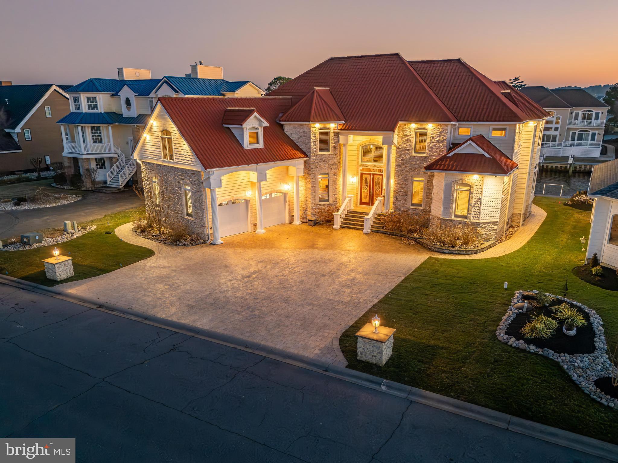 Welcome to waterfront living at its finest in the prestigious Tern’s Landing community of Ocean Pines. Situated on a premium 90-foot wide canal-front lot, this impressive 6-bedroom, 4.5-bath coastal home offers the perfect blend of luxury, comfort, and functionality.

Designed for both everyday living and unforgettable entertaining, the open-concept kitchen flows seamlessly into multiple gathering spaces, creating an ideal layout for hosting family and friends. Expansive windows invite natural light throughout, while sun-drenched decks extend the living space outdoors—perfect for morning coffee, afternoon relaxation, or sunset dining.

Boating enthusiasts will appreciate the fully equipped private dock featuring a Golden top-mounted 16,000 lb boat lift plus two jet ski swivel lifts, providing effortless access to the water and ultimate convenience for waterfront adventures.

With six spacious bedrooms, 4.5 baths, generous entertaining areas, and exceptional outdoor living, this Tern’s Landing property delivers the ultimate coastal lifestyle in one of Ocean Pines’ most desirable waterfront communities.