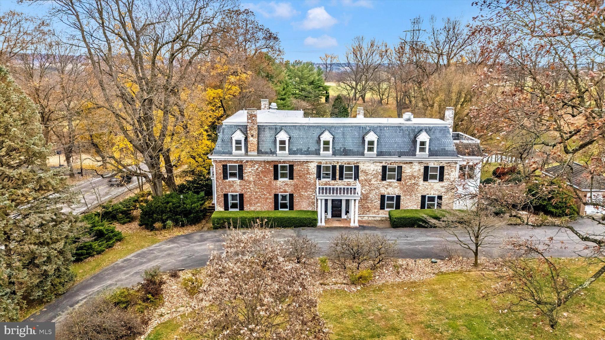 “Marameade” circa 1790 embraces its history in the Middletown Valley.  Located on 27 acres this gracious home has seen many uses over the years and is ready for its next chapter.  Over 7,000 sq ft on 3 finished levels the home has served as General McClellan’s headquarters during the Battle of South Mountain,  a nursing home, a country inn and a family home for the current owner.  Originally a traditional farmhouse the Mansford roof and the brick additions were added to give the home its distinctive look.   The three finished levels offer 8 bedrooms, 6 full bathrooms and 2 half bathrooms plus a commercial kitchen with a 6 burner Vulcan stove.   The grounds have many amenities, brick and stone patios, gardens, pond, spring house plus a massive oak tree which dates back to the 1700’s.   The outbuildings are converted to serve as garages and  storage sheds.   A  building in the rear of the property houses 4 separate housing units currently rented. Plus another building with a conference/office center and a fifth rental apartment.  The farm fields are leased to neighboring farmers.   The farm is under a conservation easement and  is contiguous to a block of 2,500 acres under conservation easement.  Both the manor home and the grounds are well maintained and reflect the pride of ownership.  This exceptional property is 2 miles northwest of the town of Middletown.