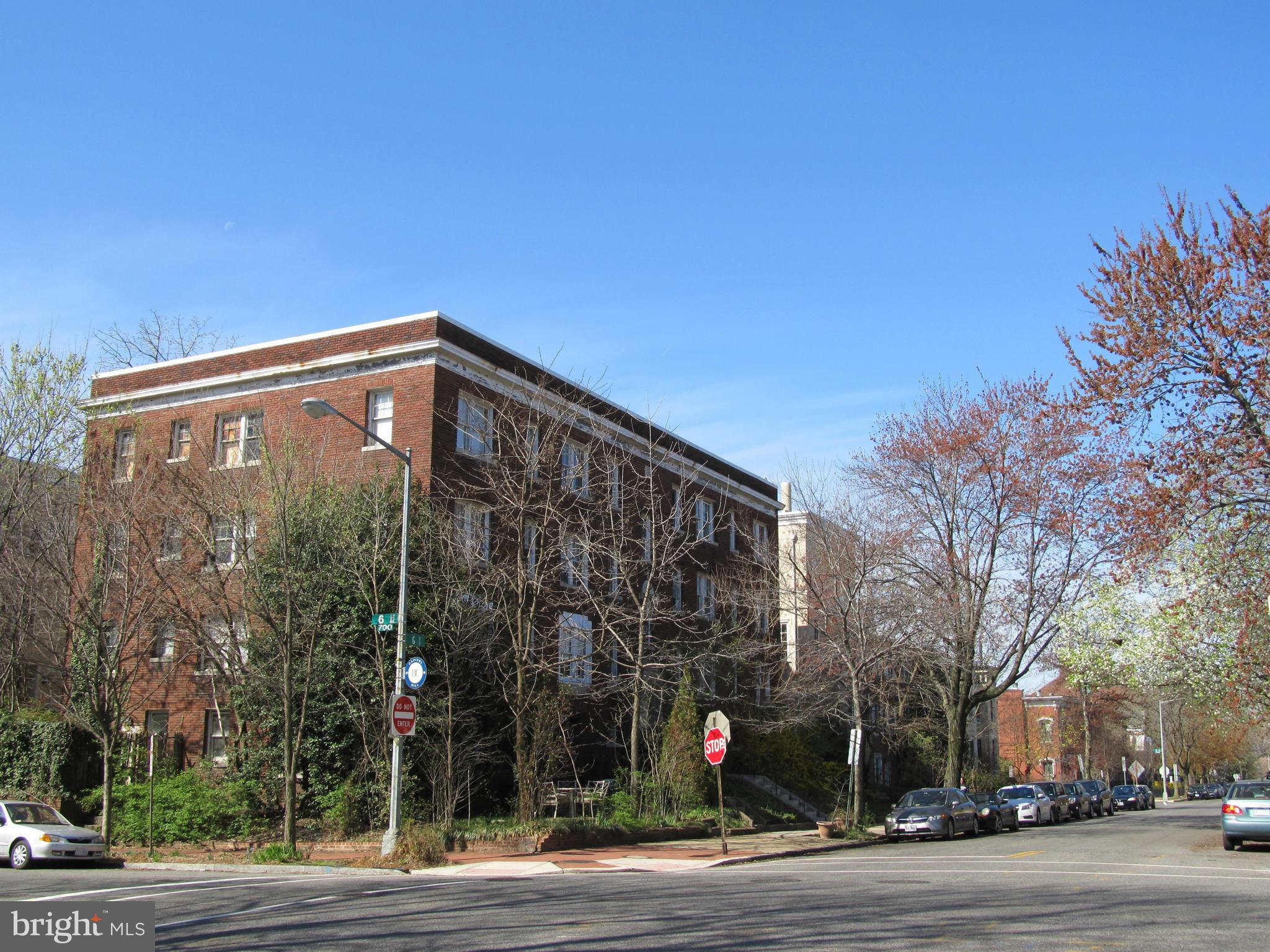 A rare find in a prime location! One of few apartment bldgs. in Capitol Hill  historic district.  Congressional staff can walk to work in 10 minutes. 17 existing spacious units, C of O for 25 units & additional unused space. can be configured in a number of ways. Solidly built in 1927, updated in 1984. Will shine after light rehab. Great views of Capitol!  Roof deck potential. Large wooded yard.